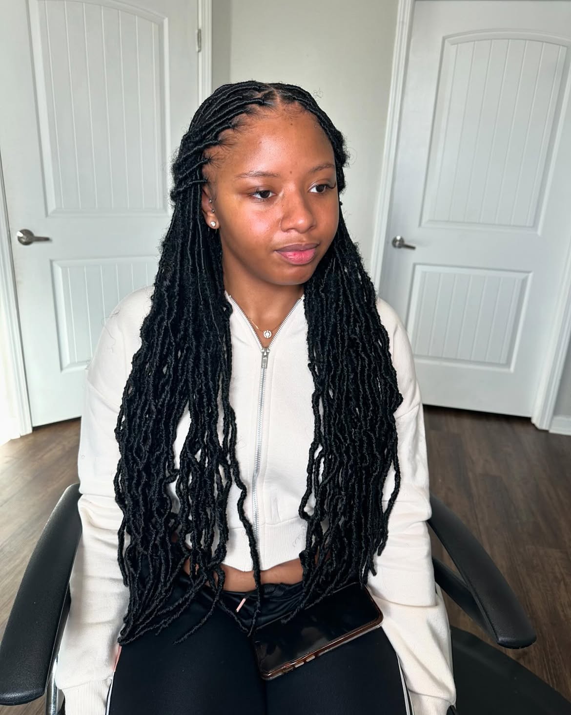 Long Wavy Faux Locs With Defined Parting