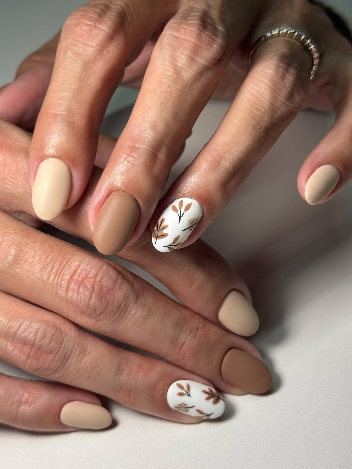 Matte Nude Leaf Art Almond Nails