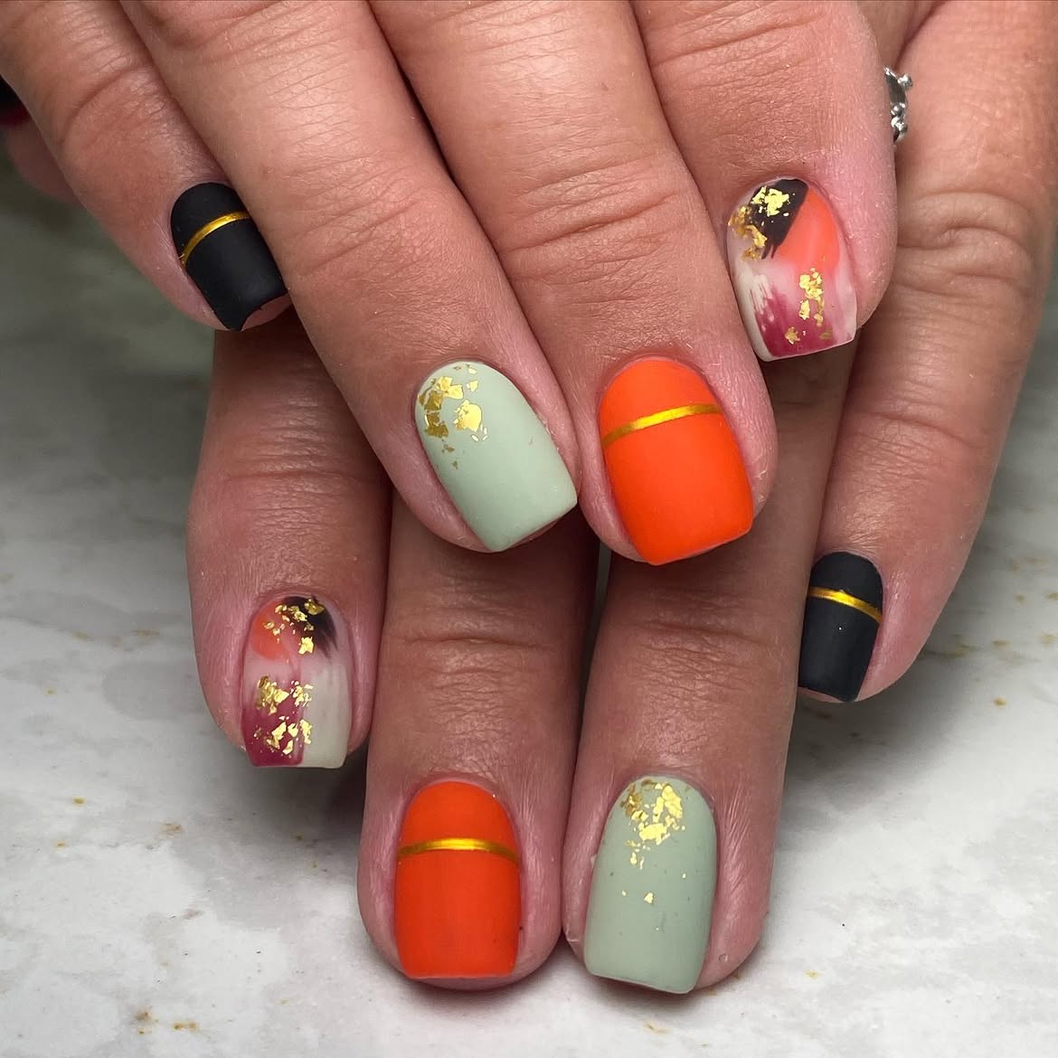 Matte Sage Green Orange Black Gold Accent Nails
