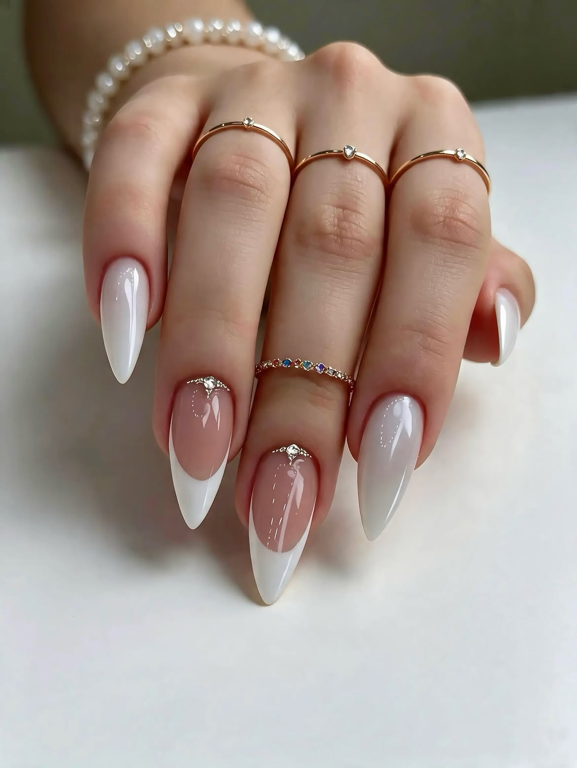 Milky White Almond French Tips with Rhinestone Accent