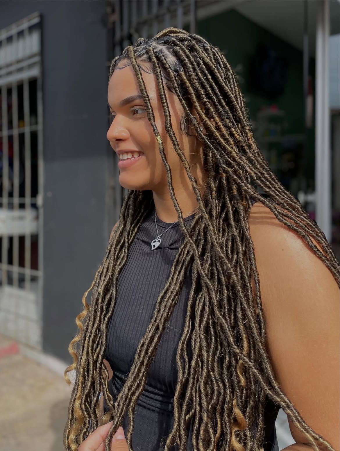 Mixed Tone Ombre Faux Locs With Curled Ends