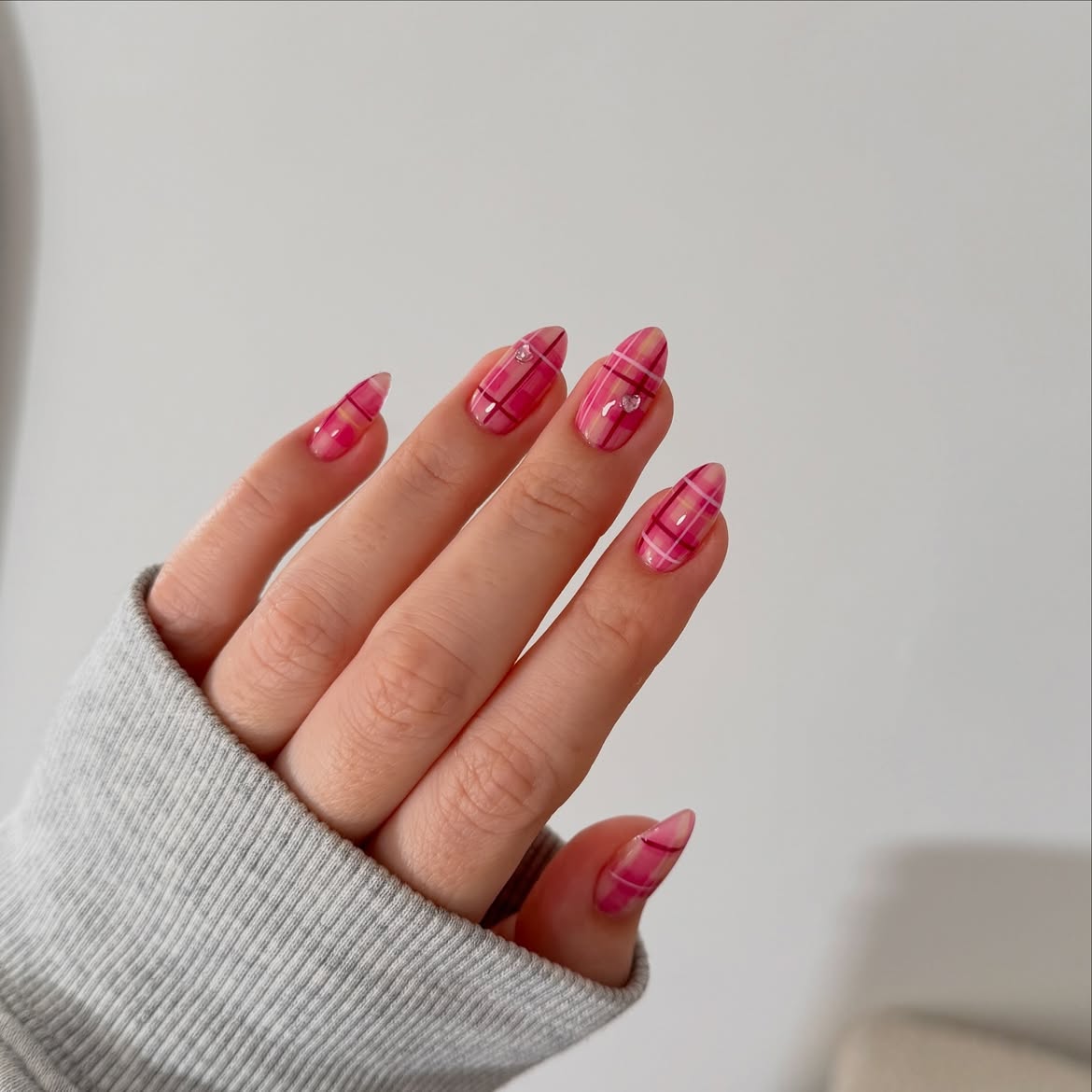 Pink Plaid Almond Nails with Subtle Sparkle