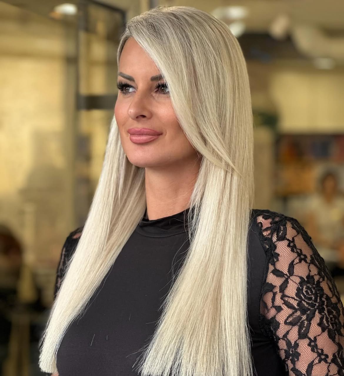 Platinum Blonde Straight Hair With Face Framing Layers