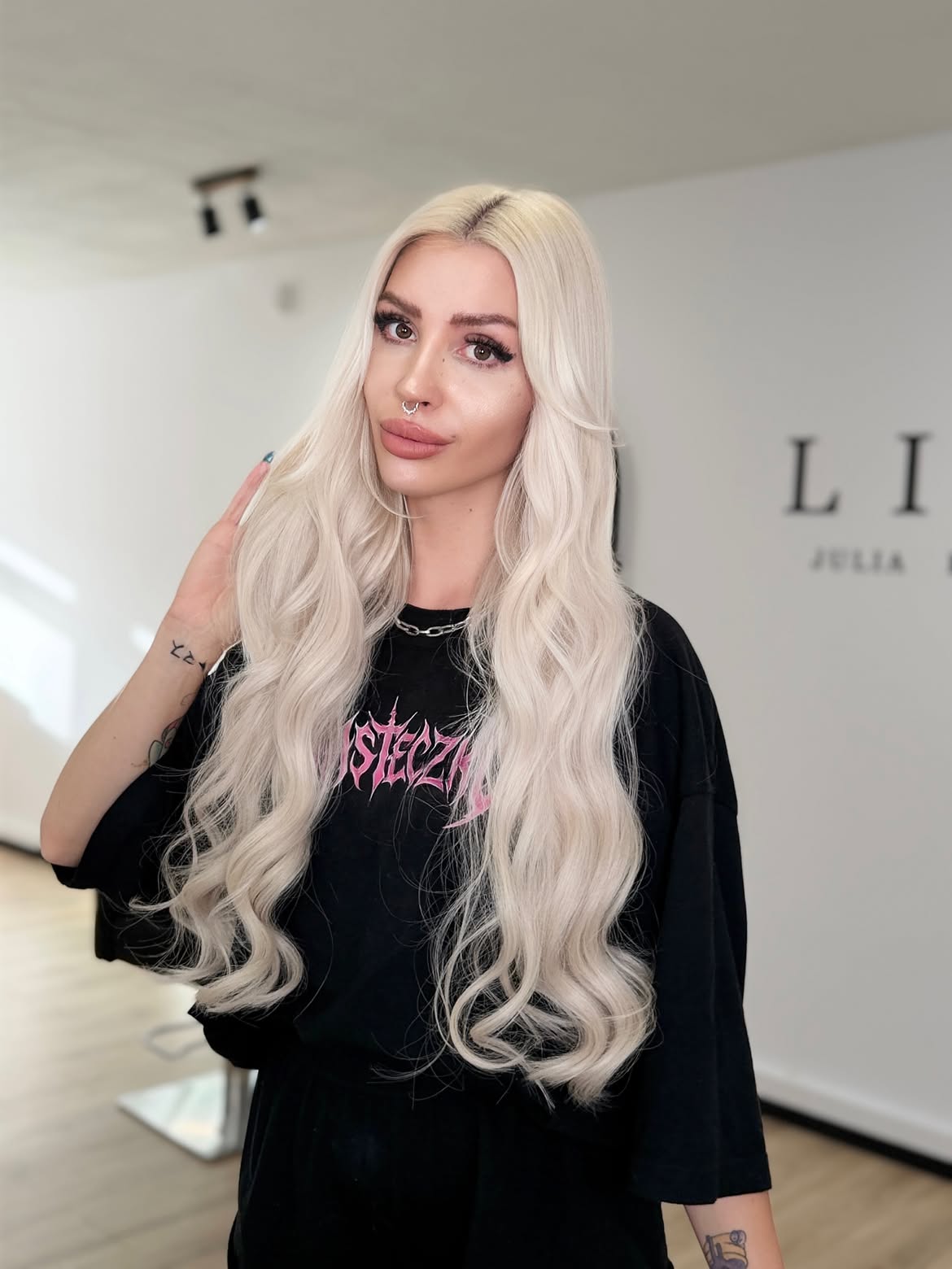 Platinum Blonde Waves With Face-Framing Layers