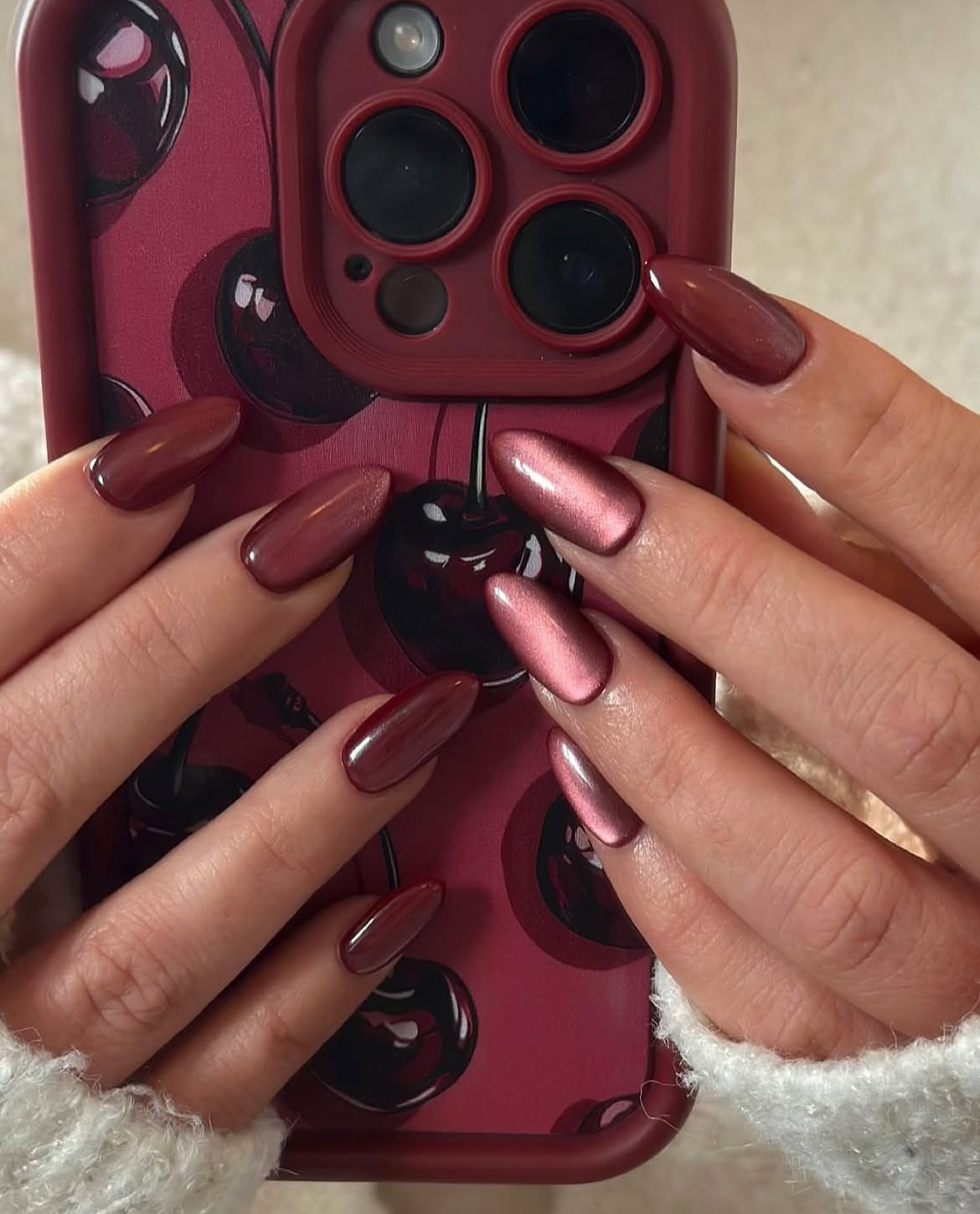 Plum Cat Eye Oval Nails With Subtle Shimmer