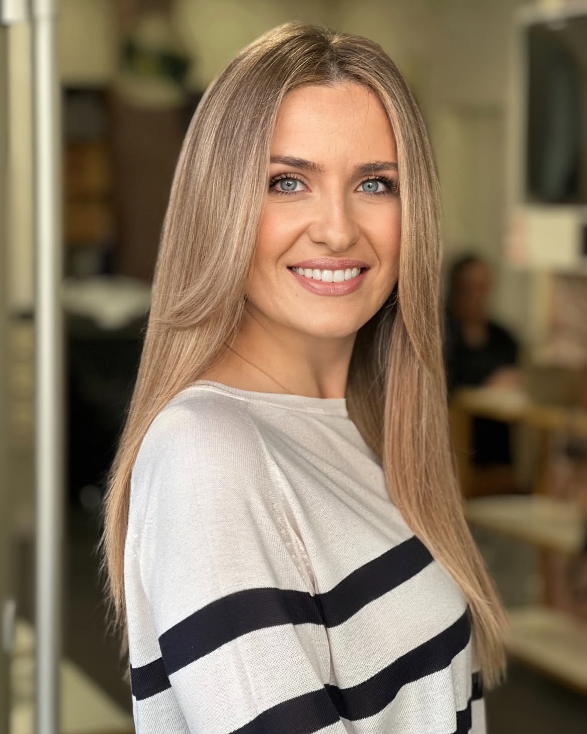 Polished Ash Blonde Long Layers With Face Framing