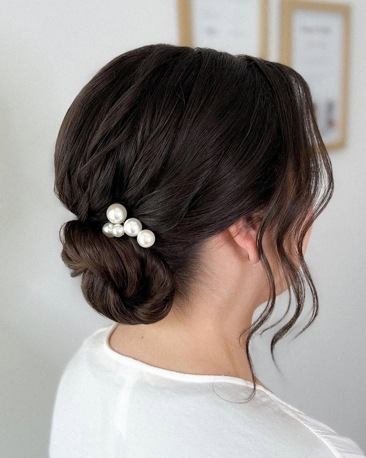 Polished Low Chignon With Pearl Hair Accessory
