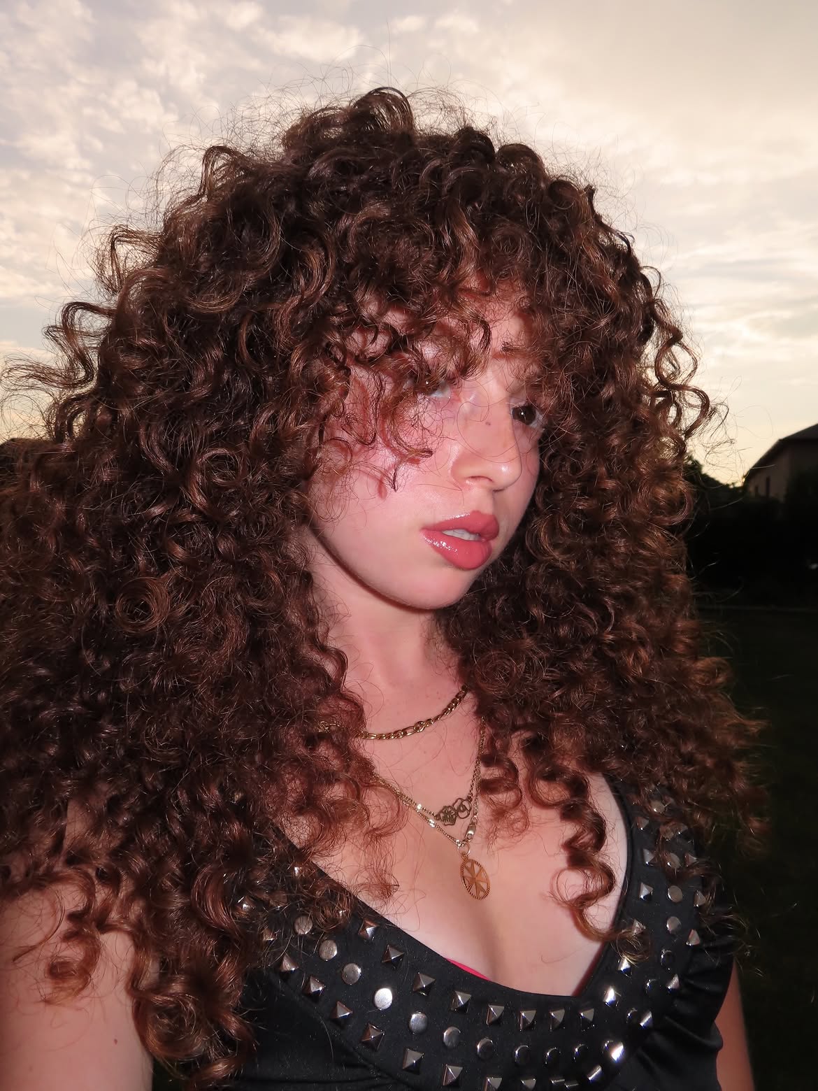 Rich Auburn Curls With Defined Waves