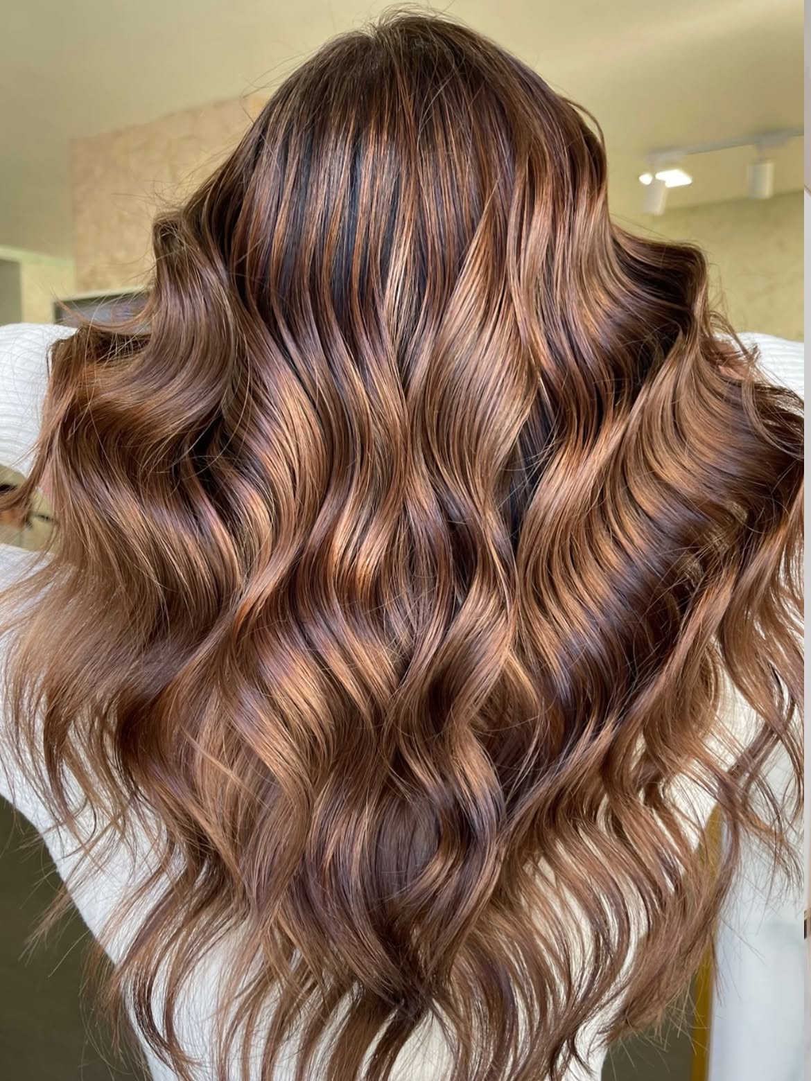 Rich Bronde Waves With Subtle Copper Highlights