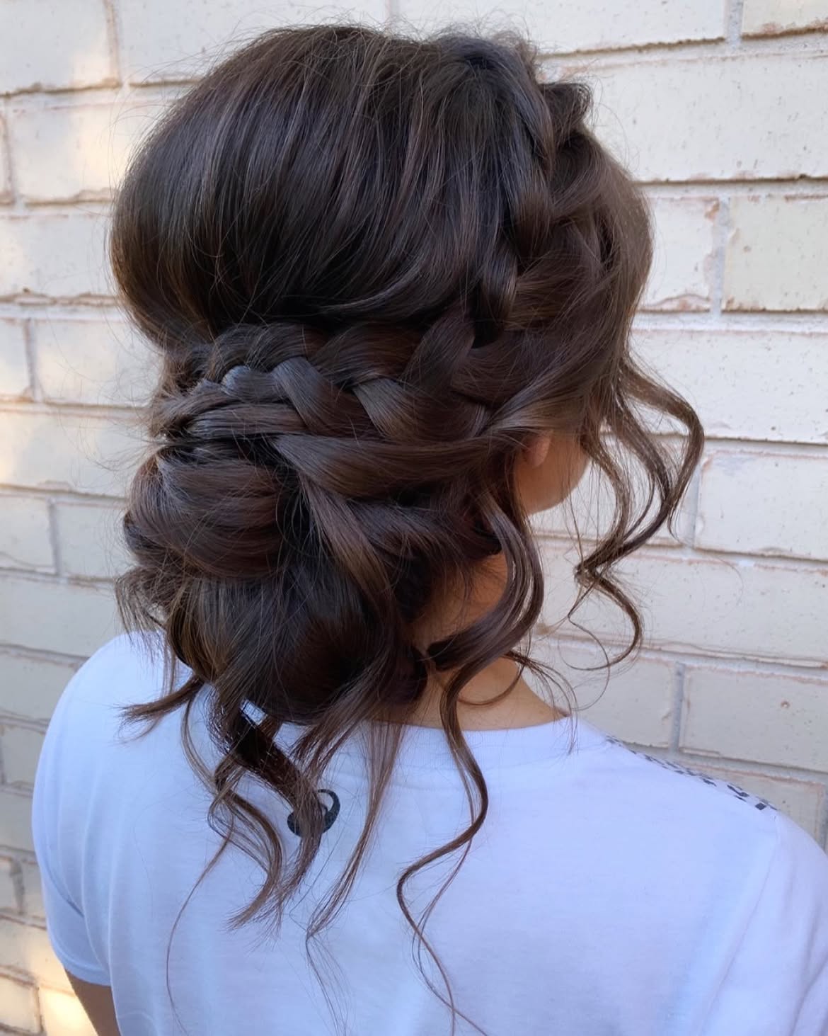 Romantic Braided Updo With Loose Curls