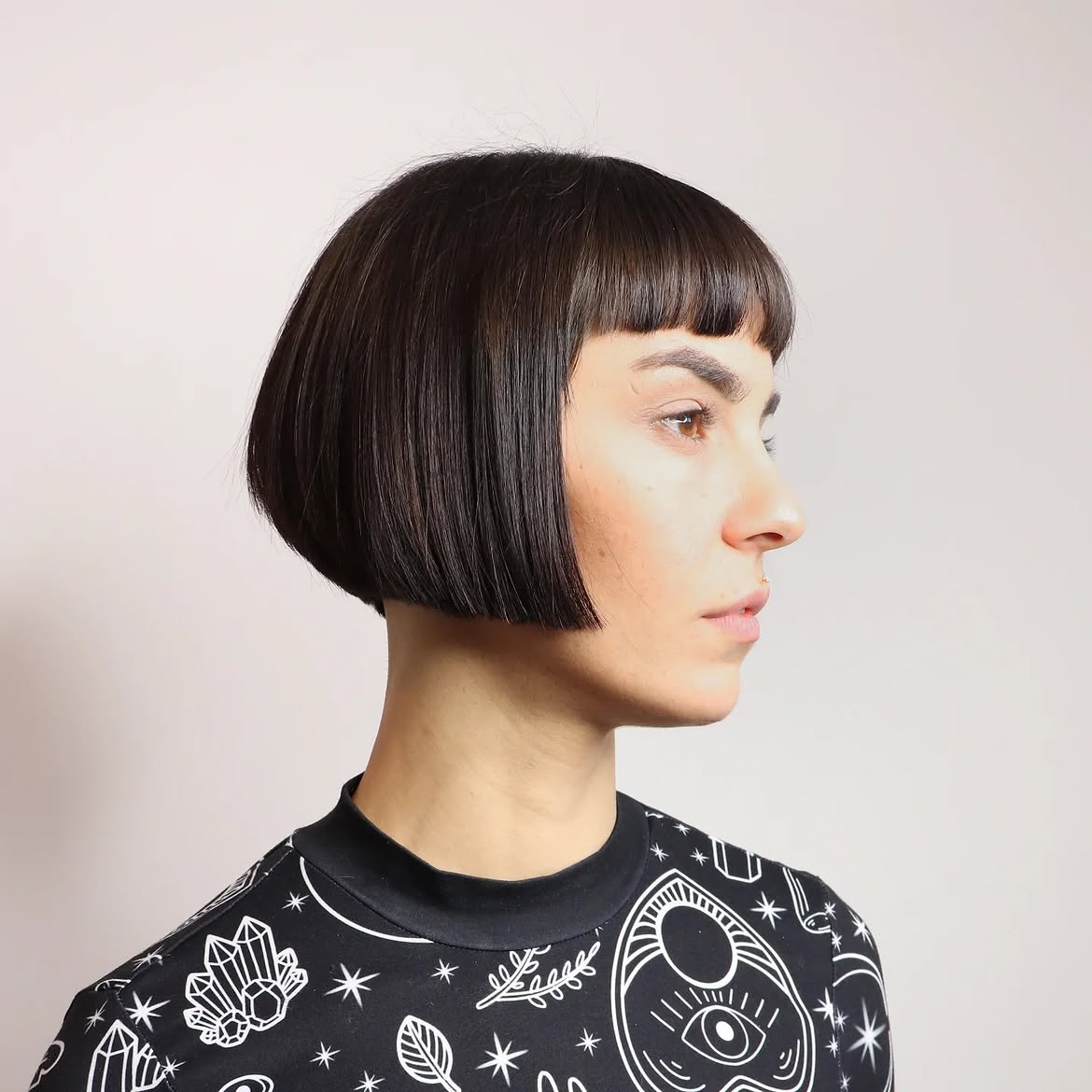 Sharp Micro Bangs On Dark Chin Length Bob