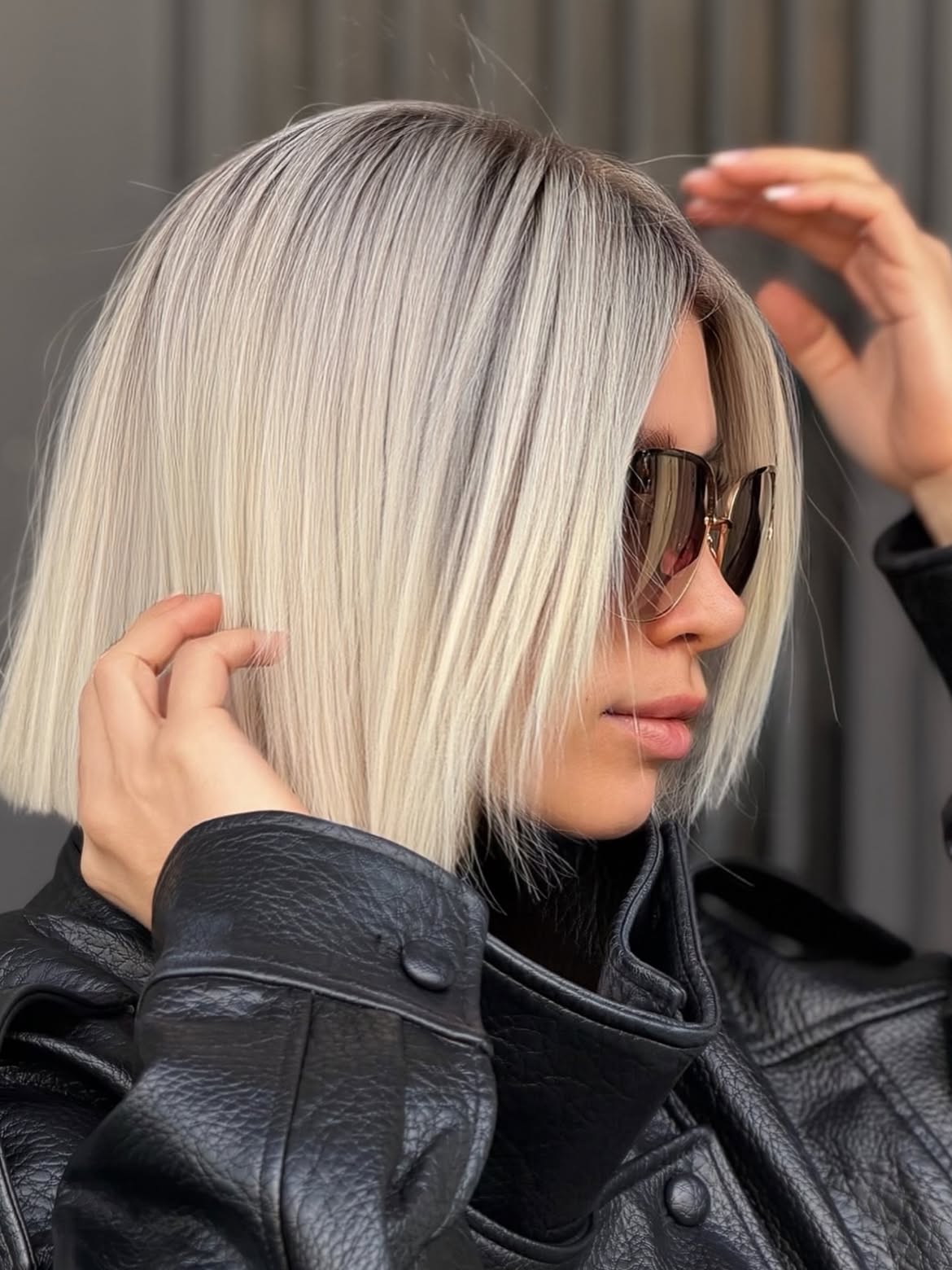 Sharp Platinum Blonde Bob With Subtle Root Smudge