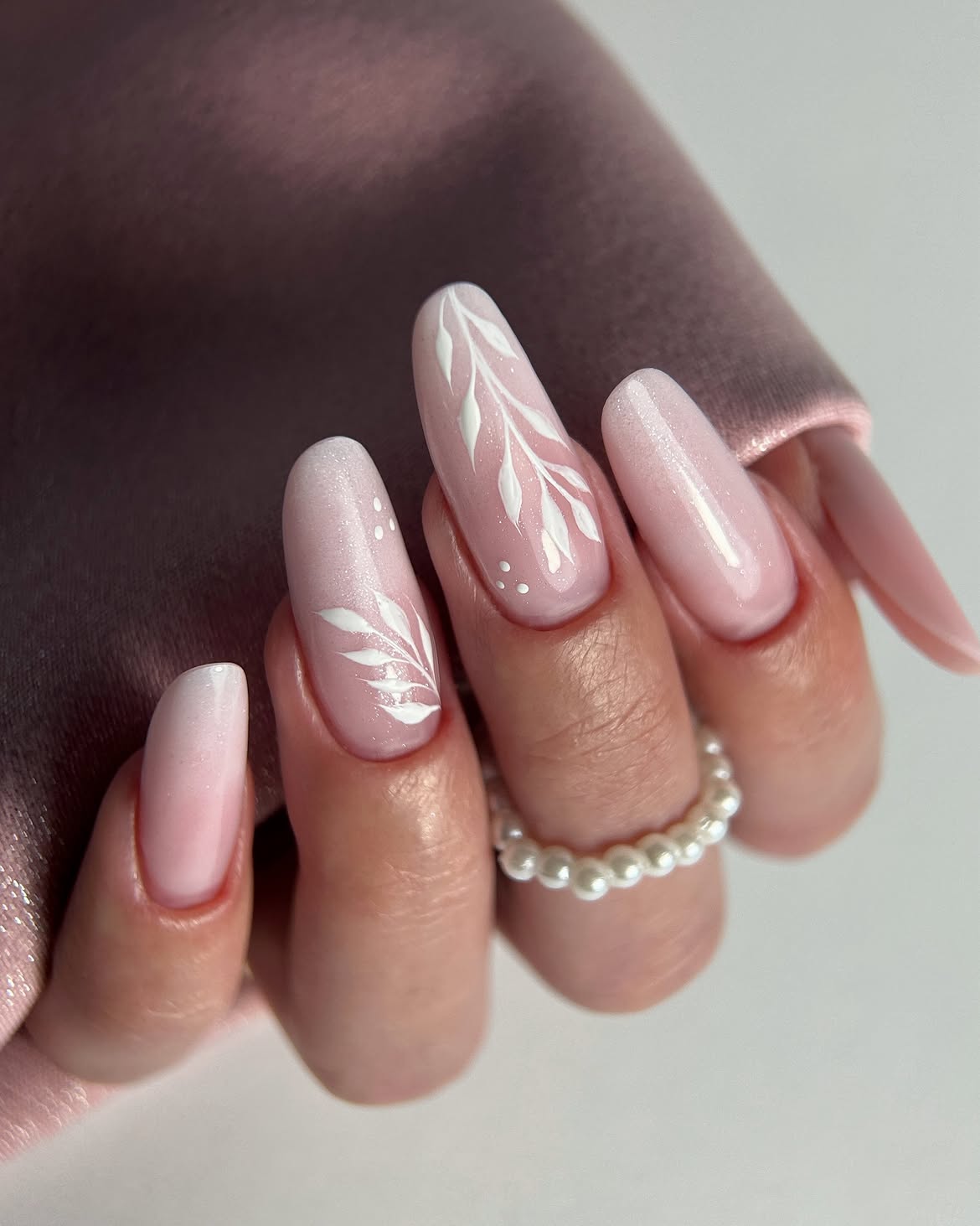 Shimmering Pink Floral Leaf Almond Nails