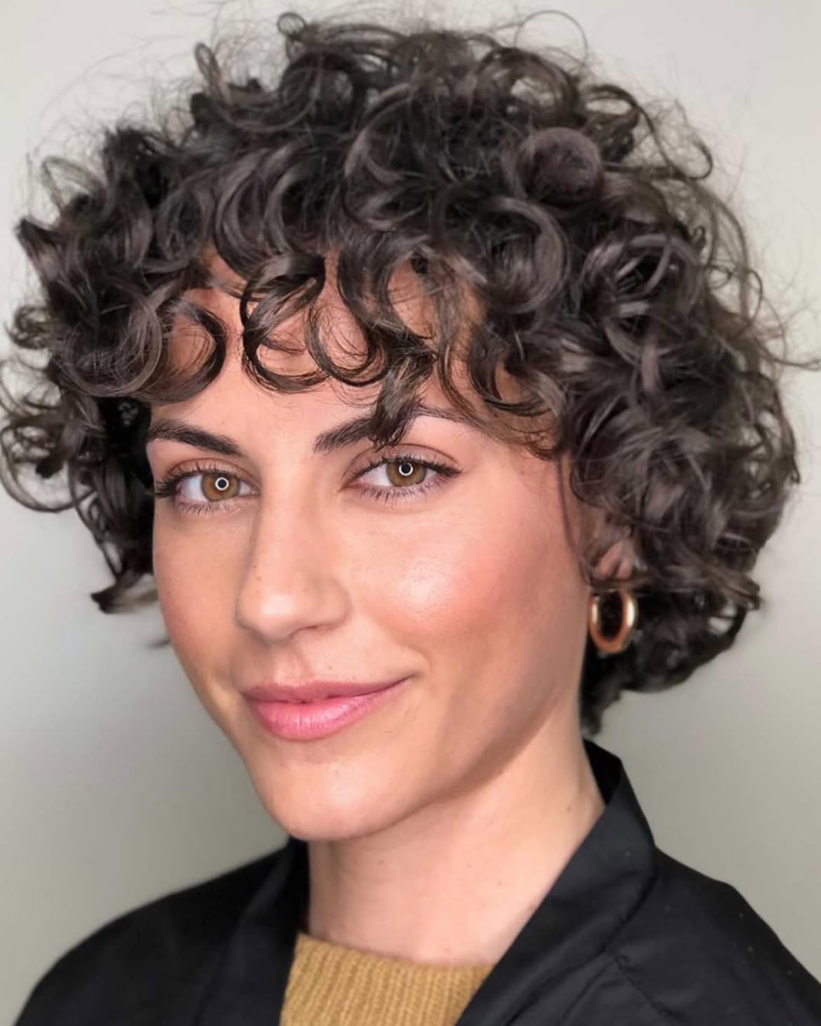 Short Curly Bob With Choppy Bangs