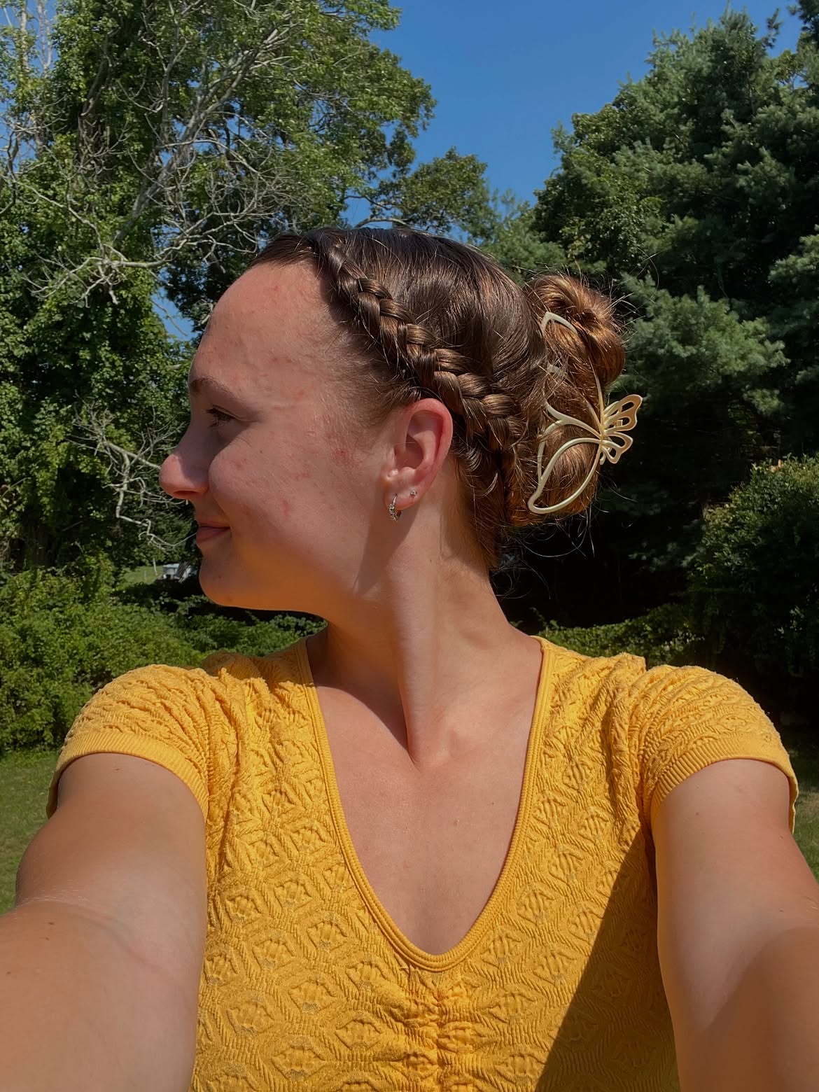 Side Crown Braid With Double Buns