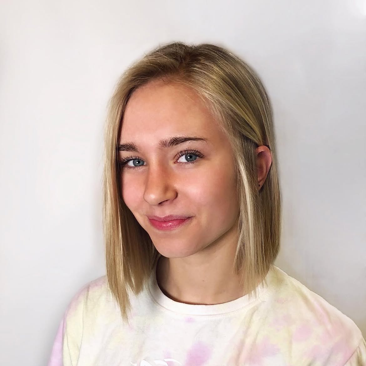 Sleek Blonde Bob With Subtle Face Framing