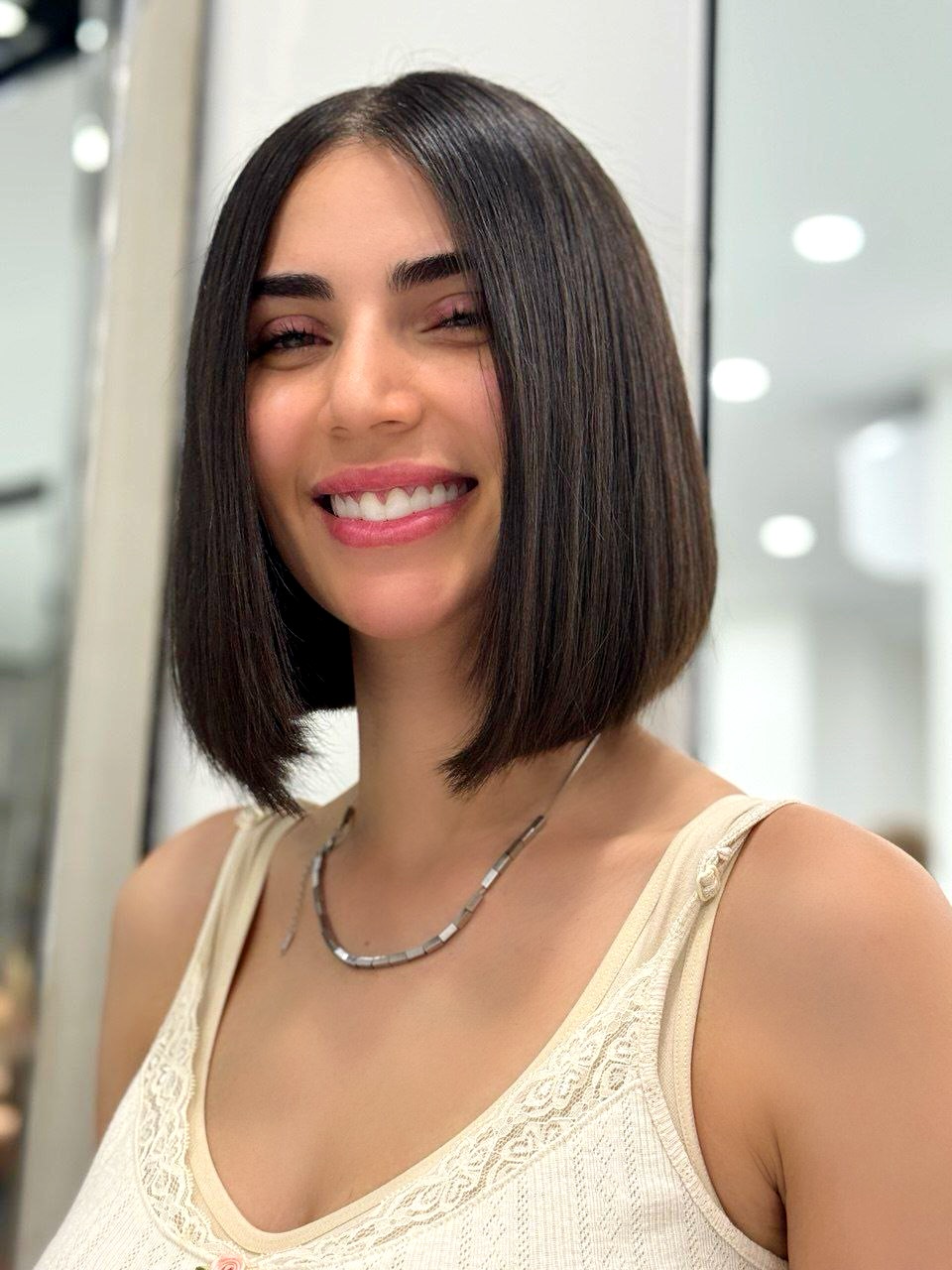Sleek Chocolate Brown Blunt Bob With Subtle Layers