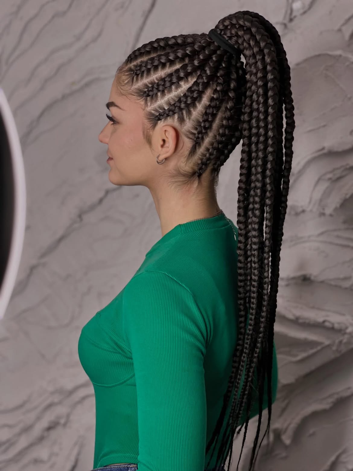 Sleek Cornrow Braids Into High Ponytail
