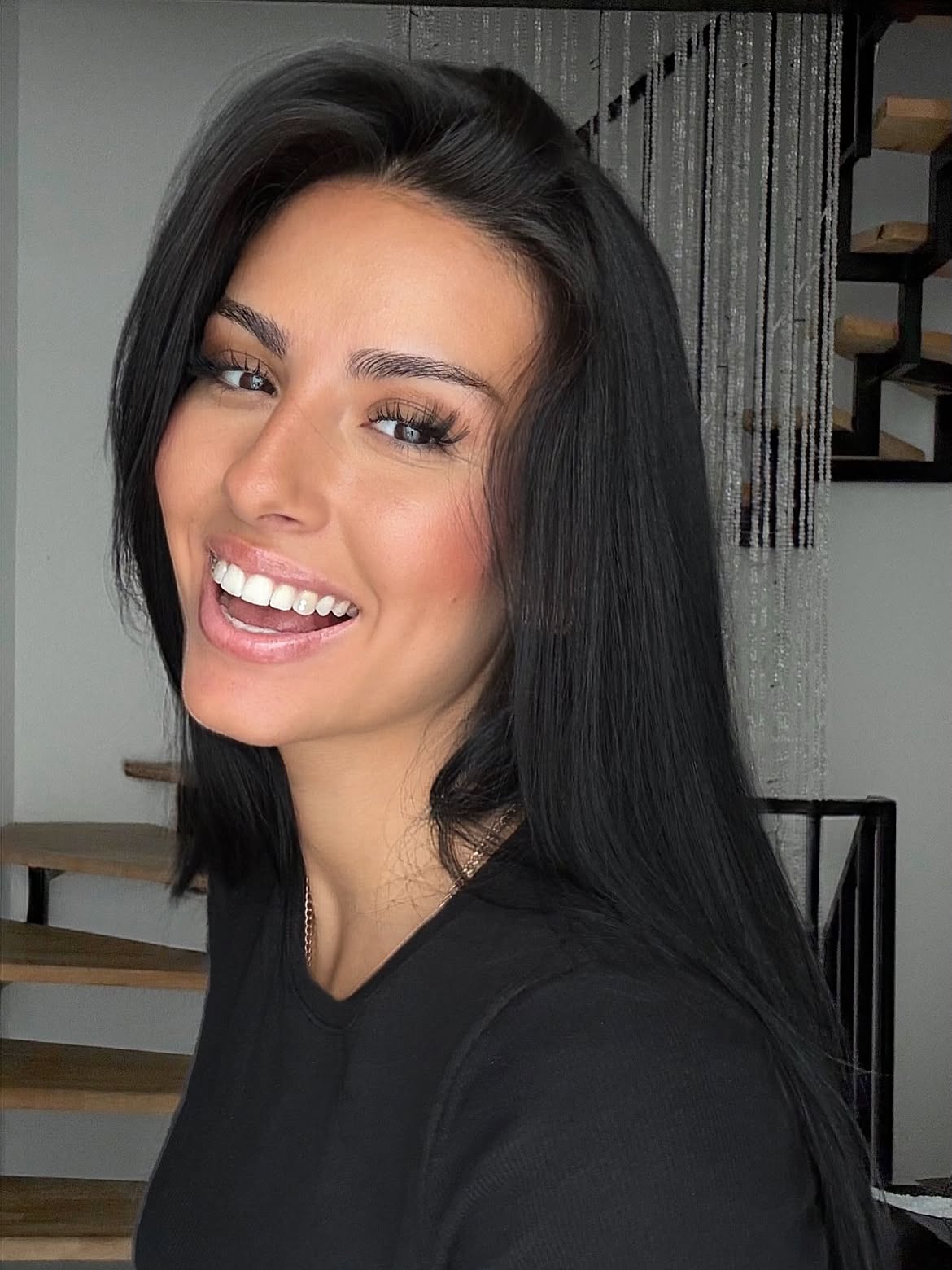 Sleek Glossy Jet Black Long Layered Cut