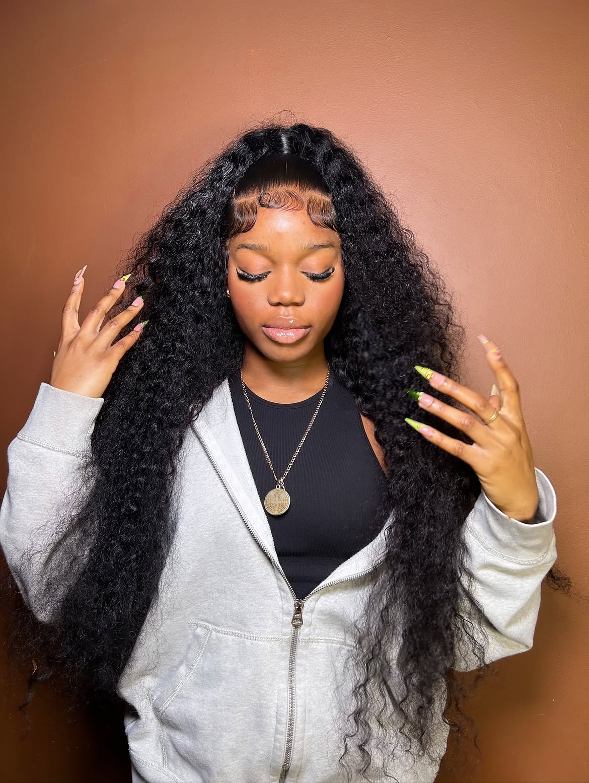 Sleek Half-Up High Ponytail With Deep Waves