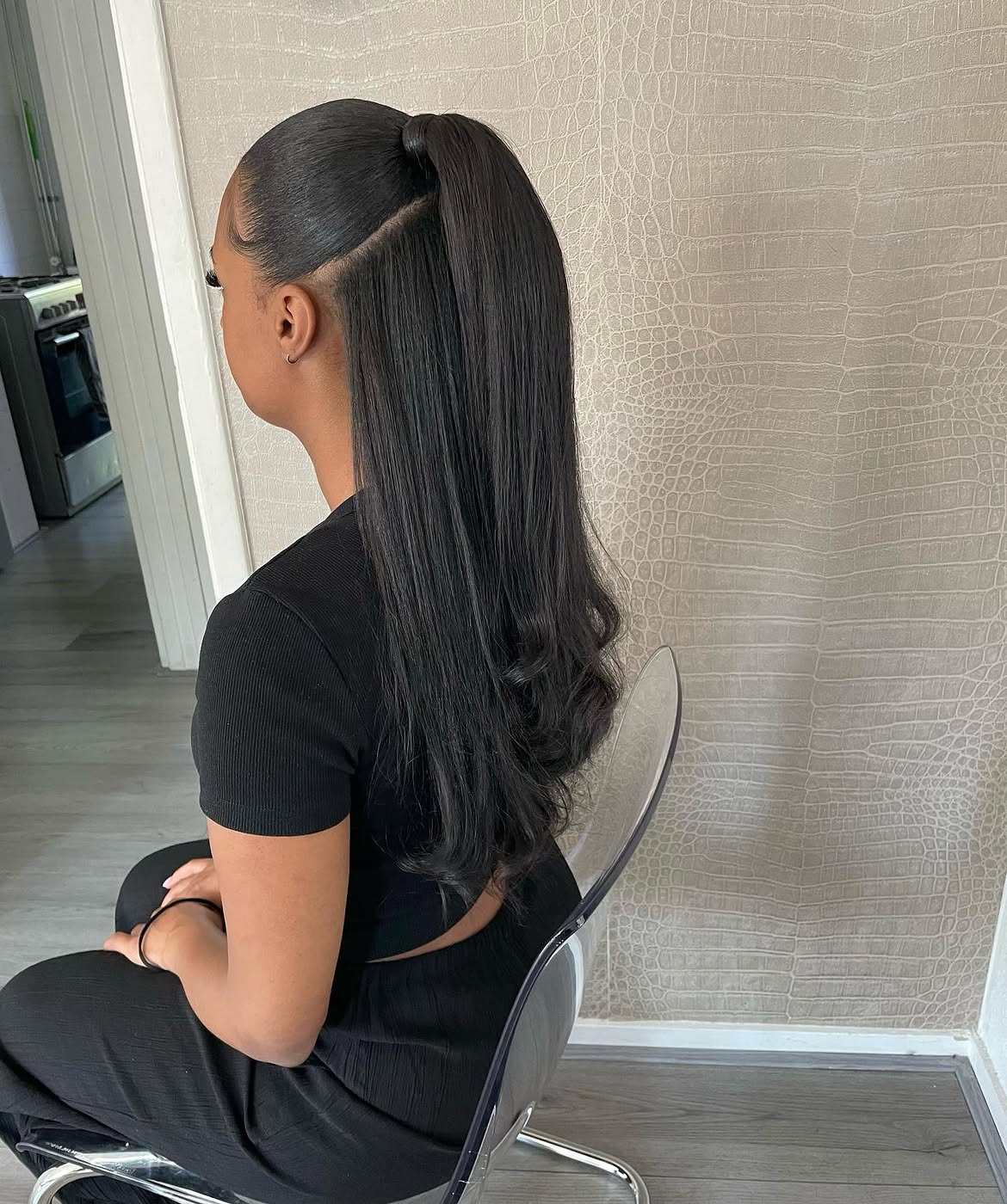 Sleek High Ponytail With Wrapped Accent