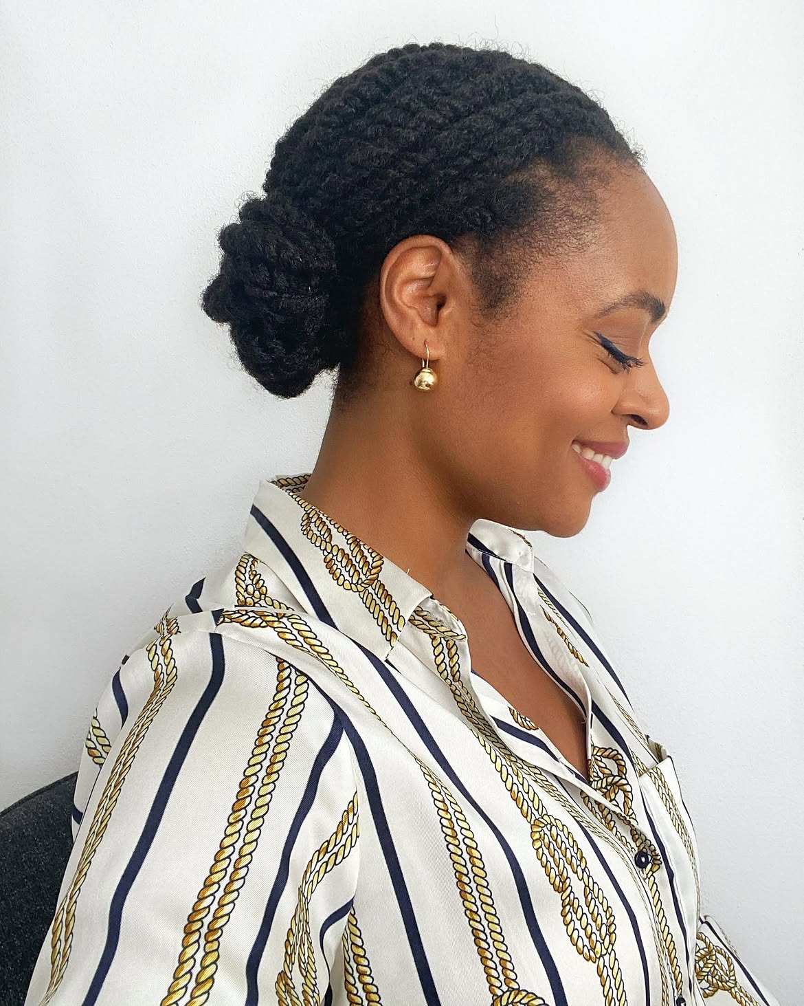 Sleek Low Twisted Bun For Natural Hair