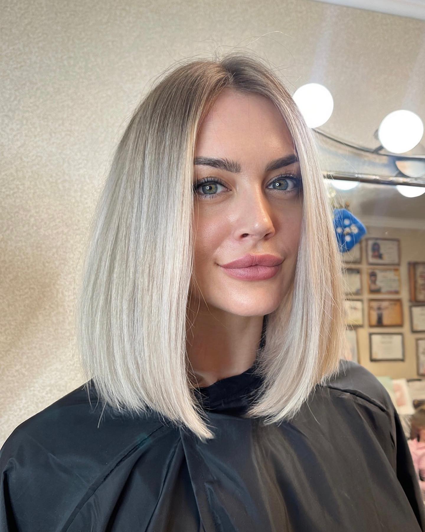 Sleek Platinum Blonde Blunt Bob With Face-Framing