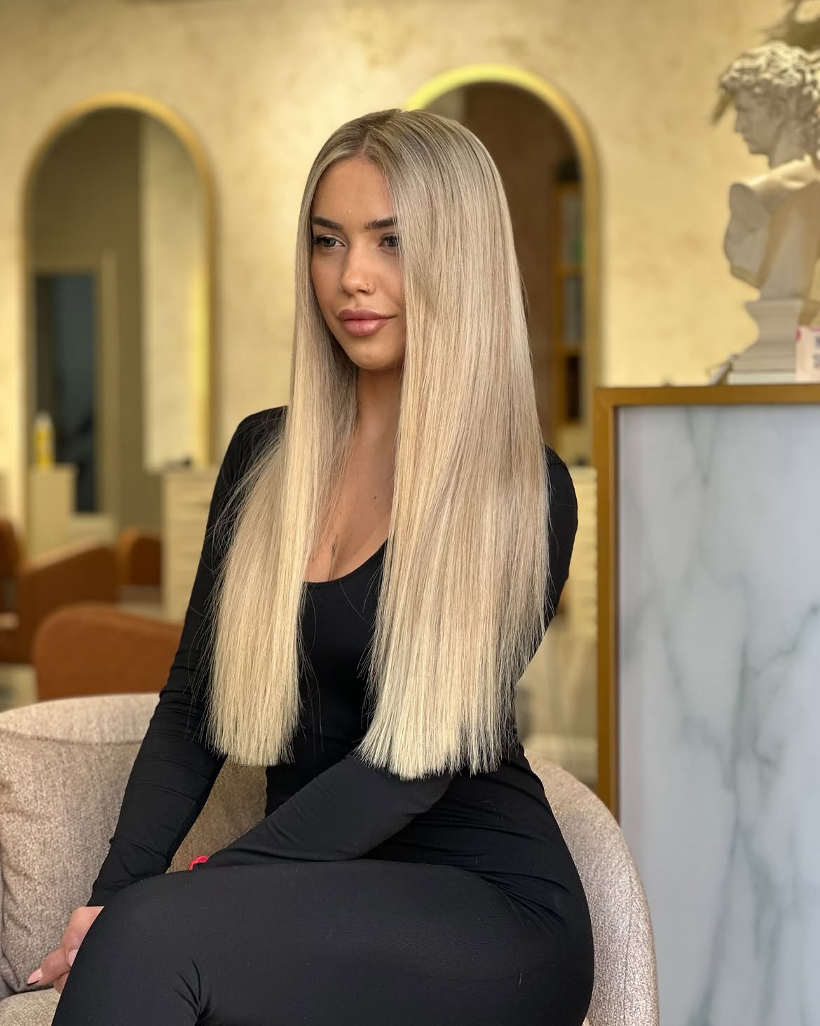 Sleek Platinum Blonde Long Hair With Subtle Face Framing