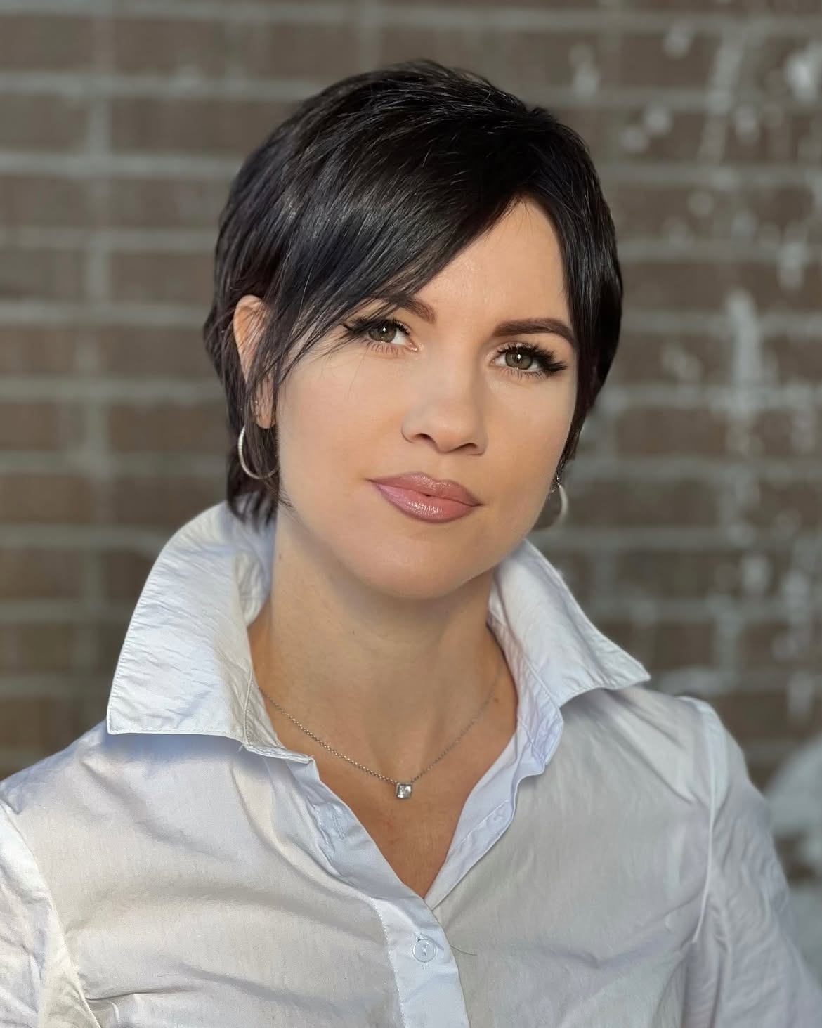 Sleek Side-Swept Pixie Bob With Subtle Layers