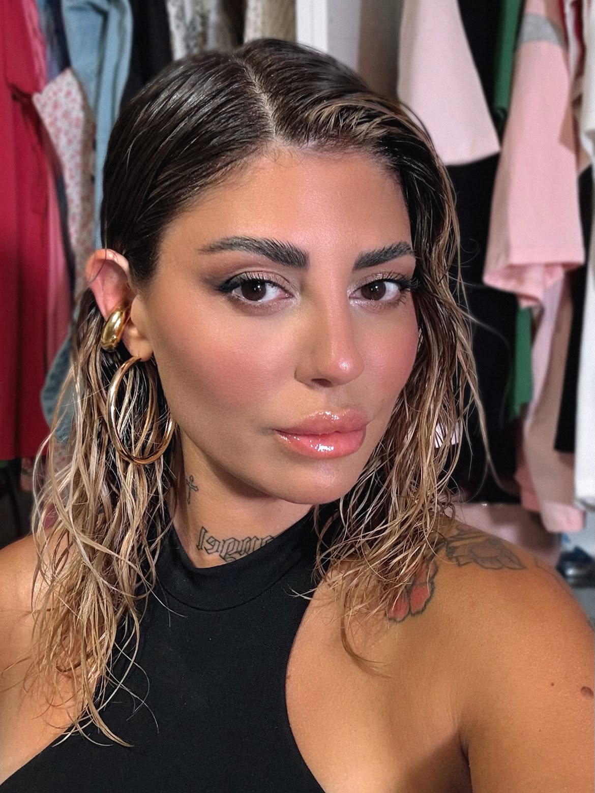 Sleek Wet Look With Dark Roots And Highlights