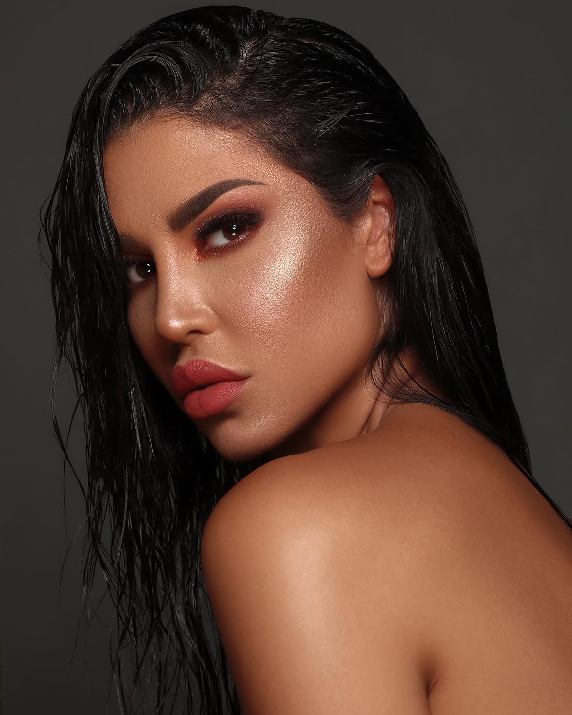 Sleek Wet Look With Deep Side Part