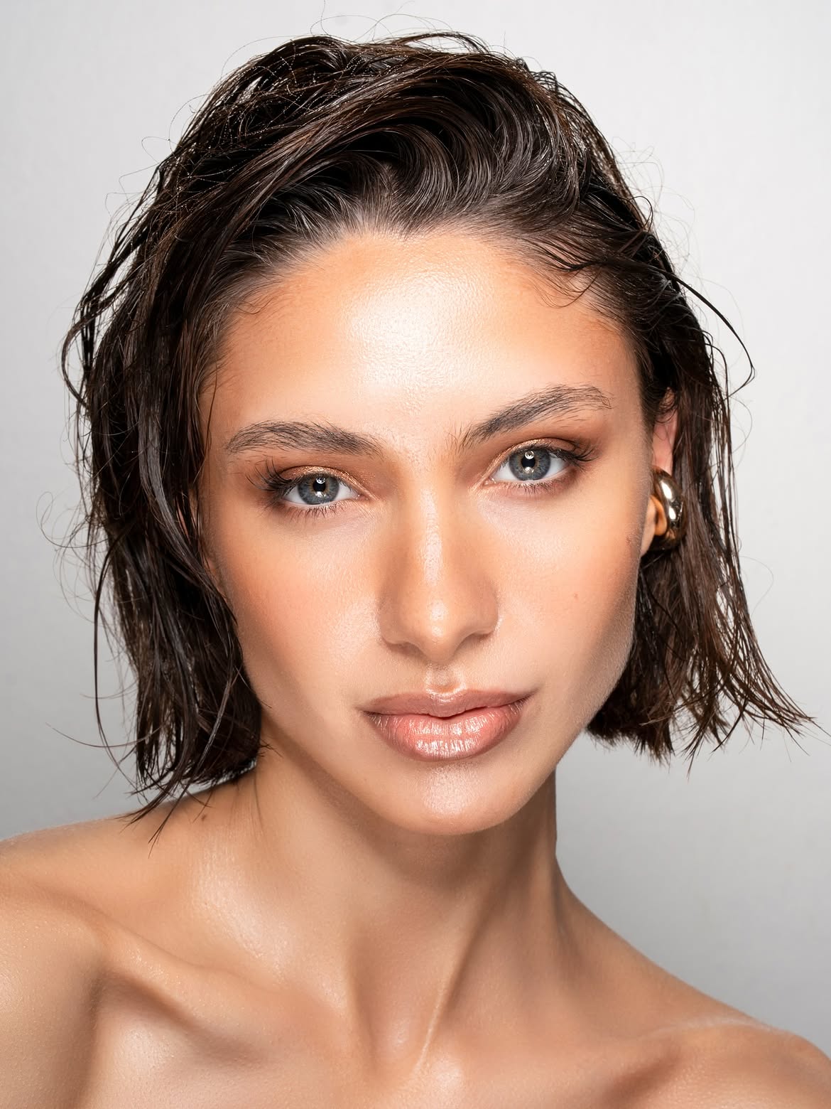 Slicked Back Wet Look Chin Length Bob