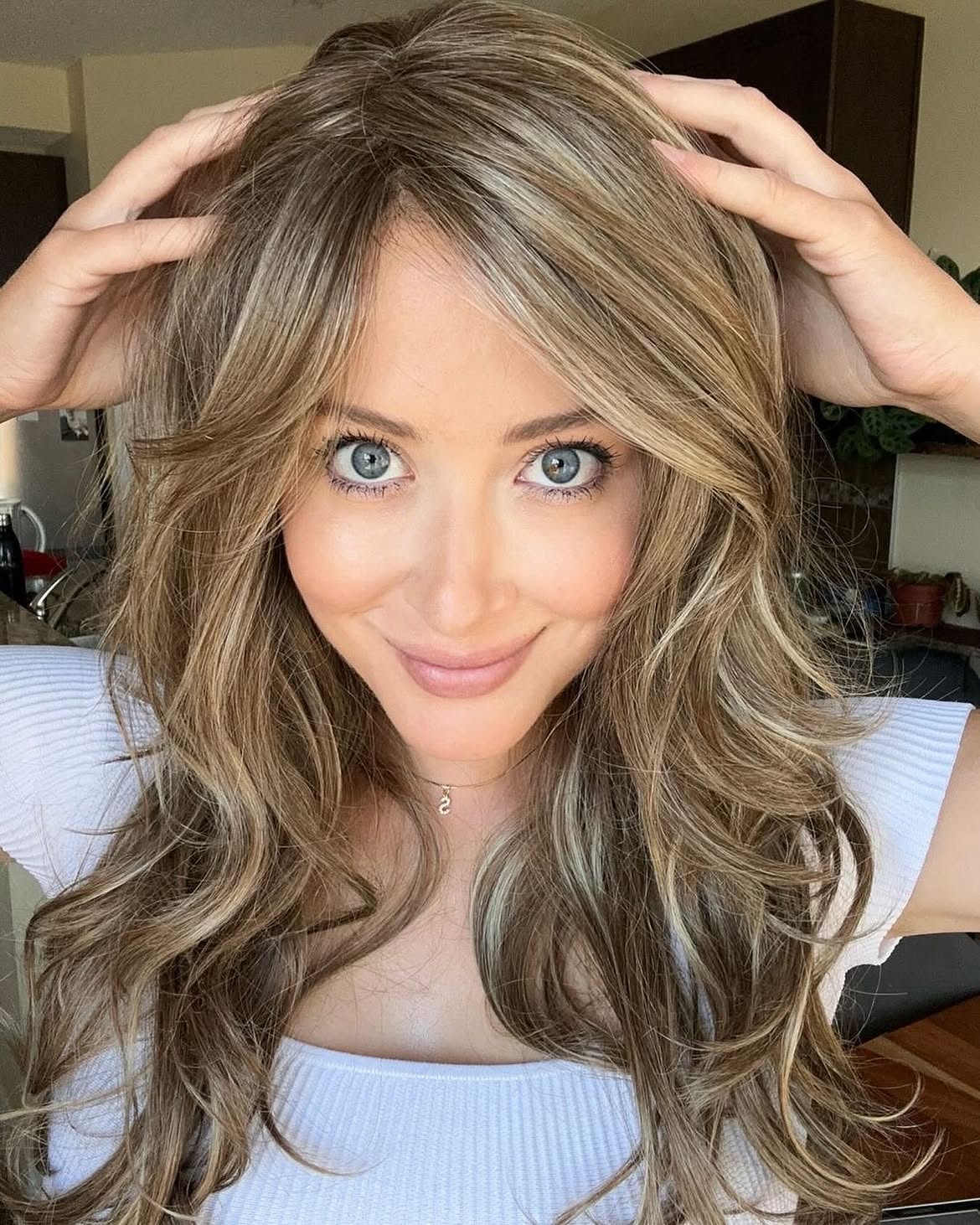 Soft Honey Blonde Waves With Face Framing Layers