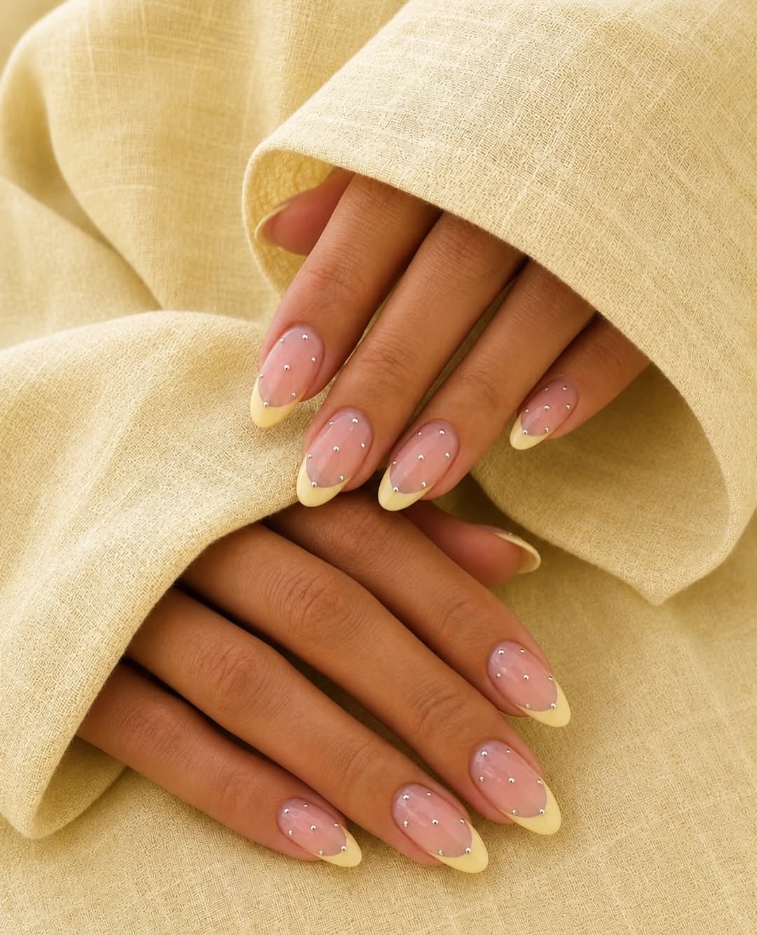 Soft Yellow French Tip Almond Nails With Pearls