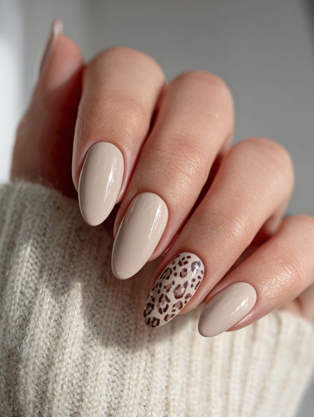 Sophisticated Beige Leopard Print Almond Nails