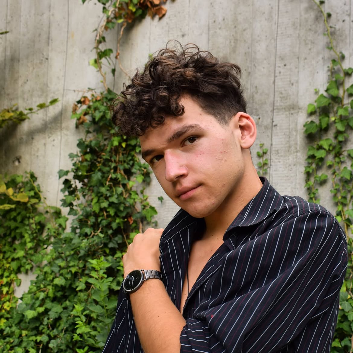 Textured Crop With Mid-Fade On Curly Hair