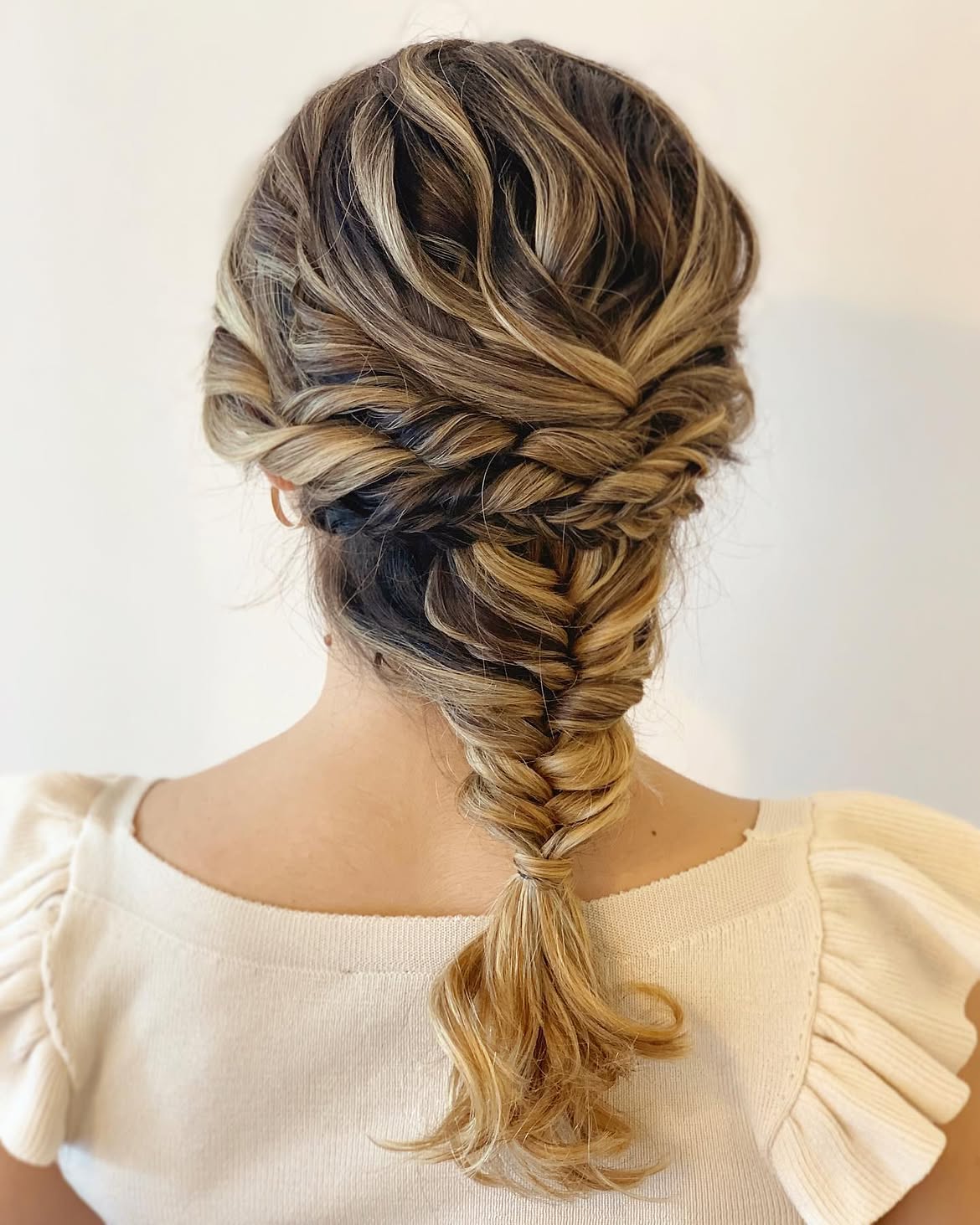 Textured Fishtail Braid Updo For Highlighted Hair