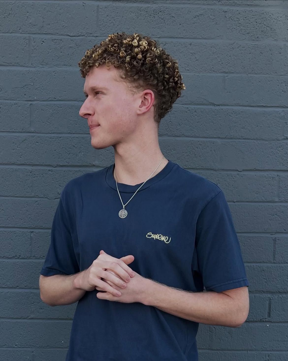 Textured Honey Blonde Ringlets With Fade