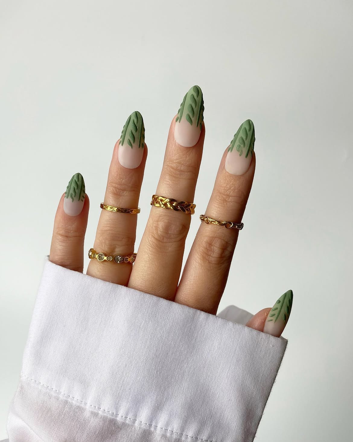 Textured Matte Green Leaf French Tip Almond Nails