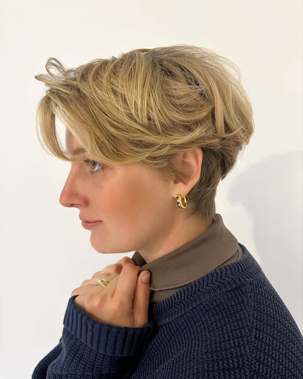 Textured Platinum Blonde Pixie With Wispy Bangs