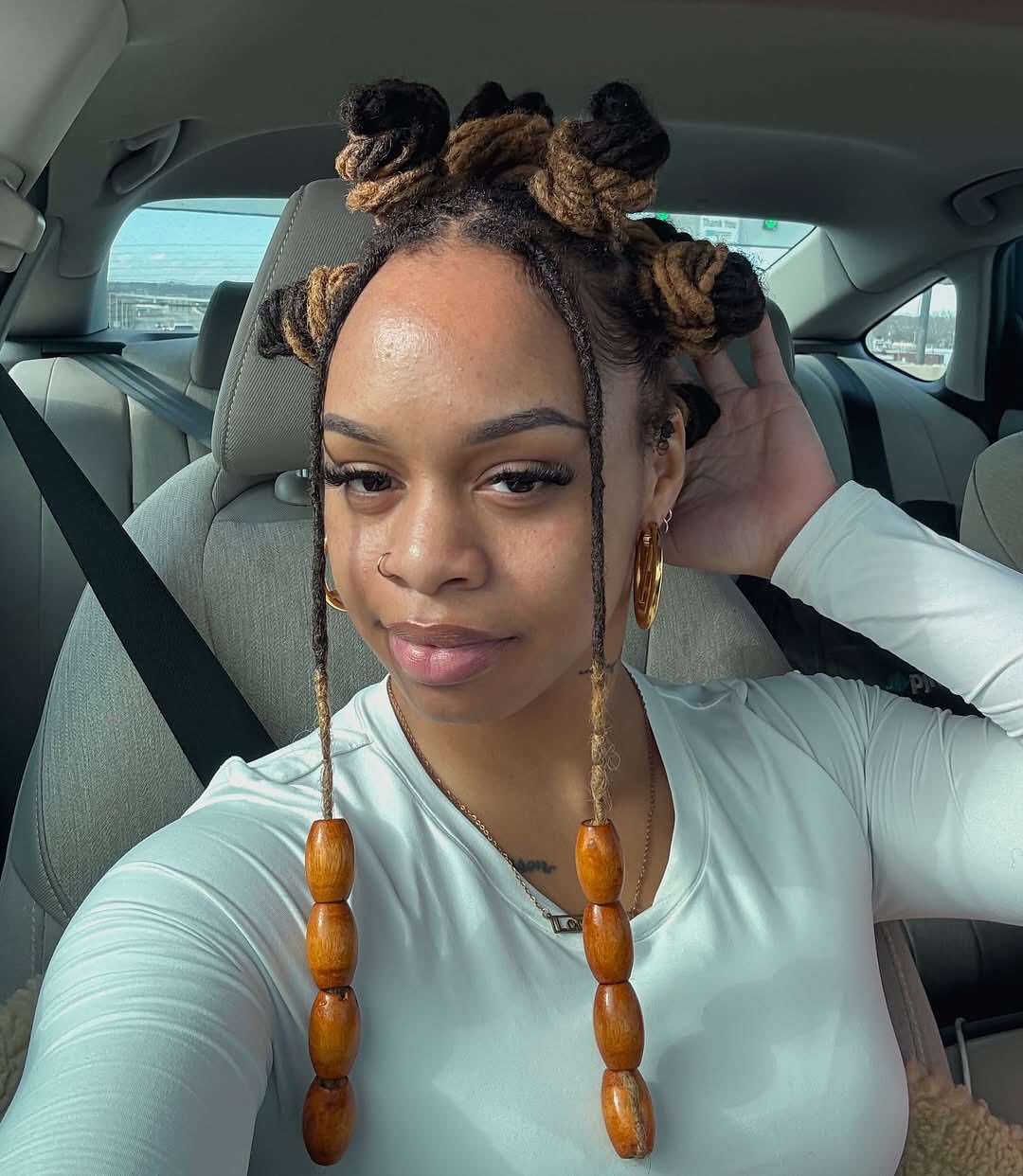 Top Knots With Wooden Bead Accents On Locs