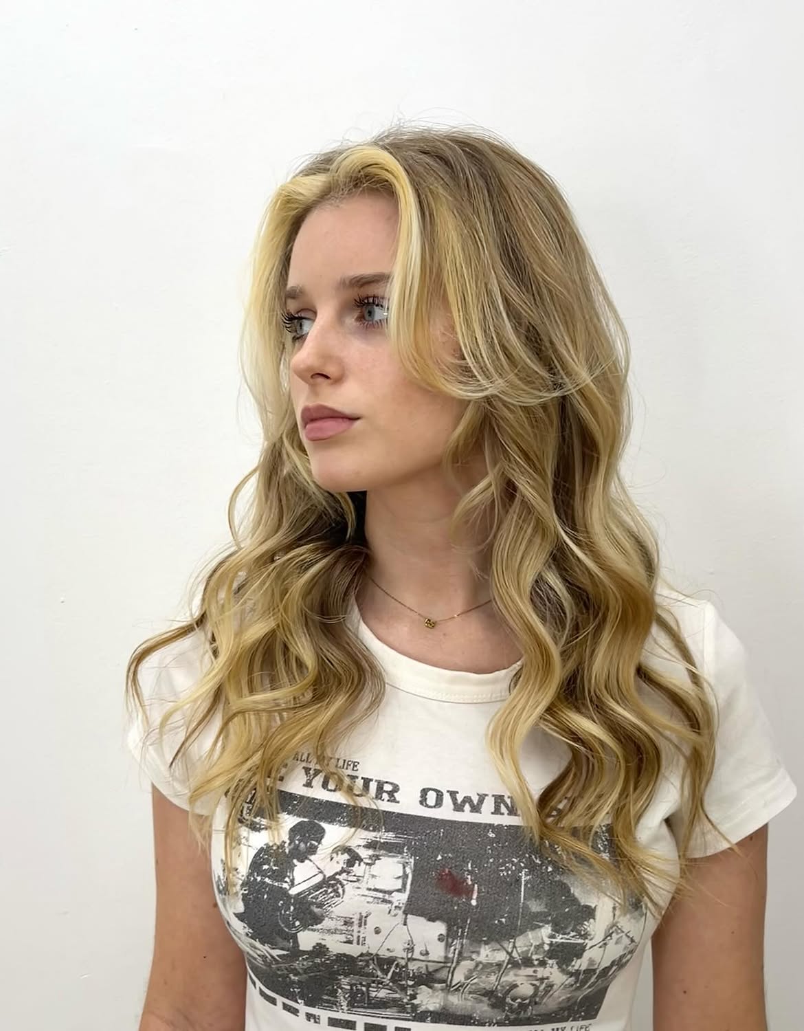 Tousled Blonde Waves With Face-Framing Layers