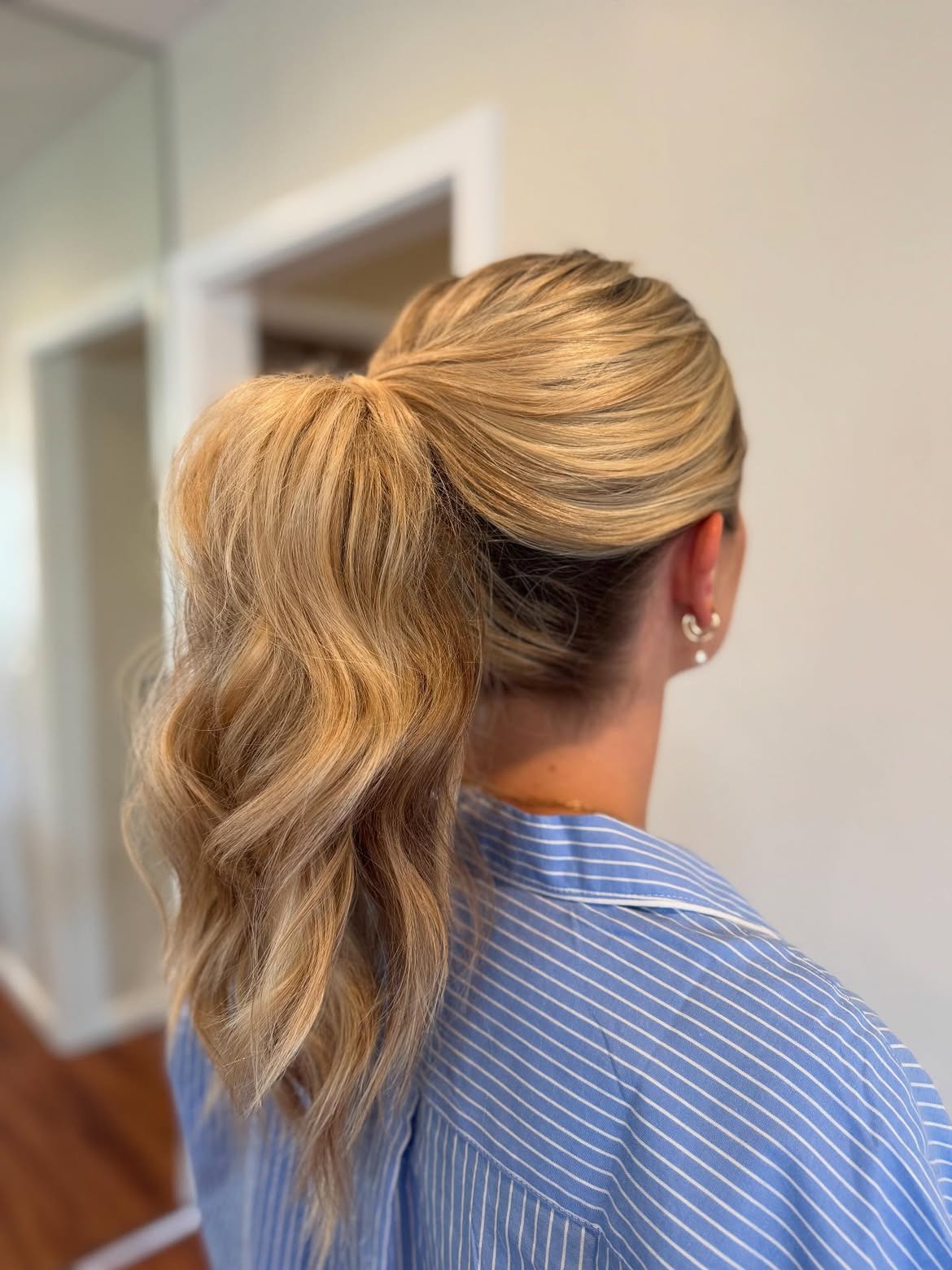 Tousled High Ponytail With Loose Waves