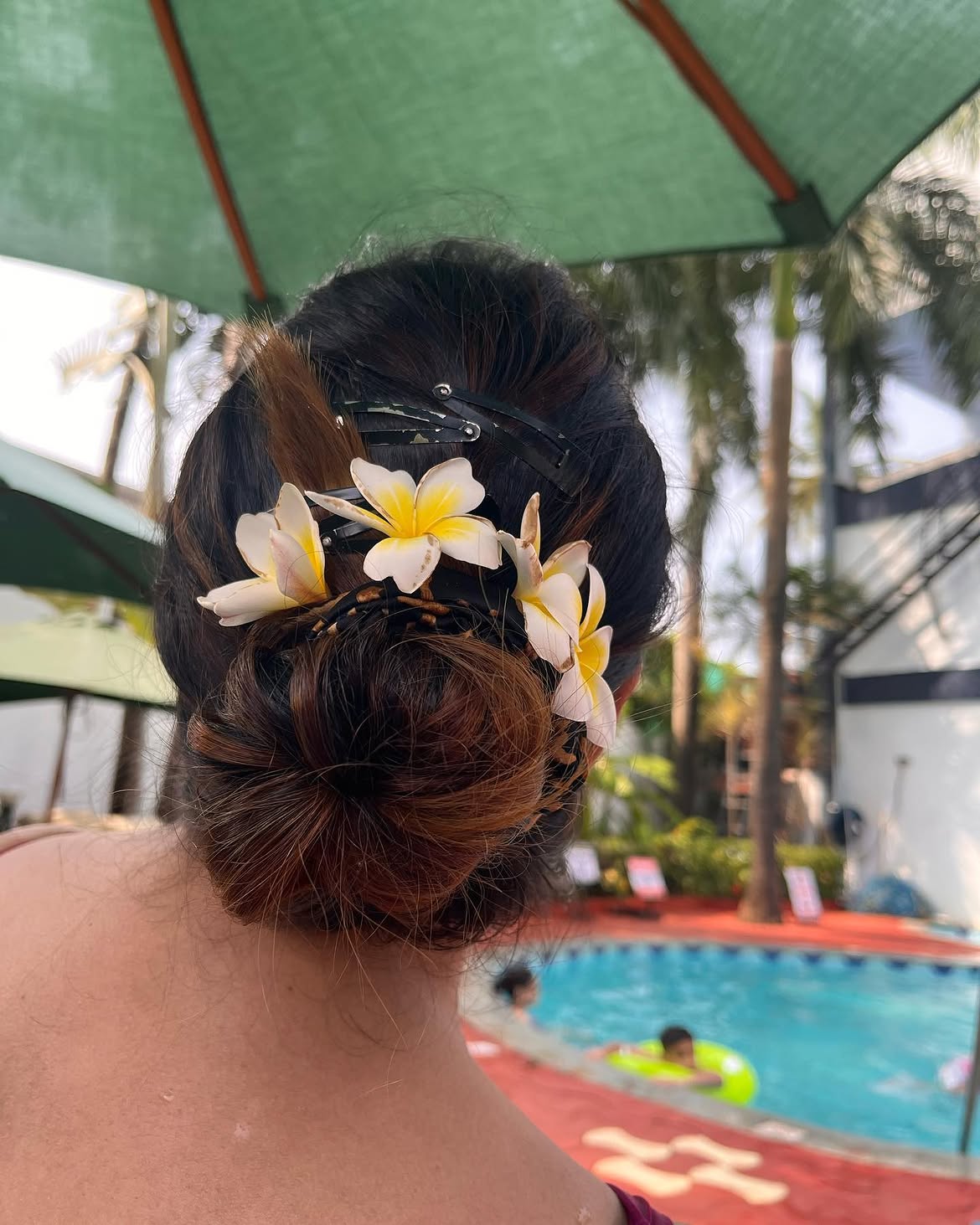 Tropical Flower Low Bun For Summer Pool Days
