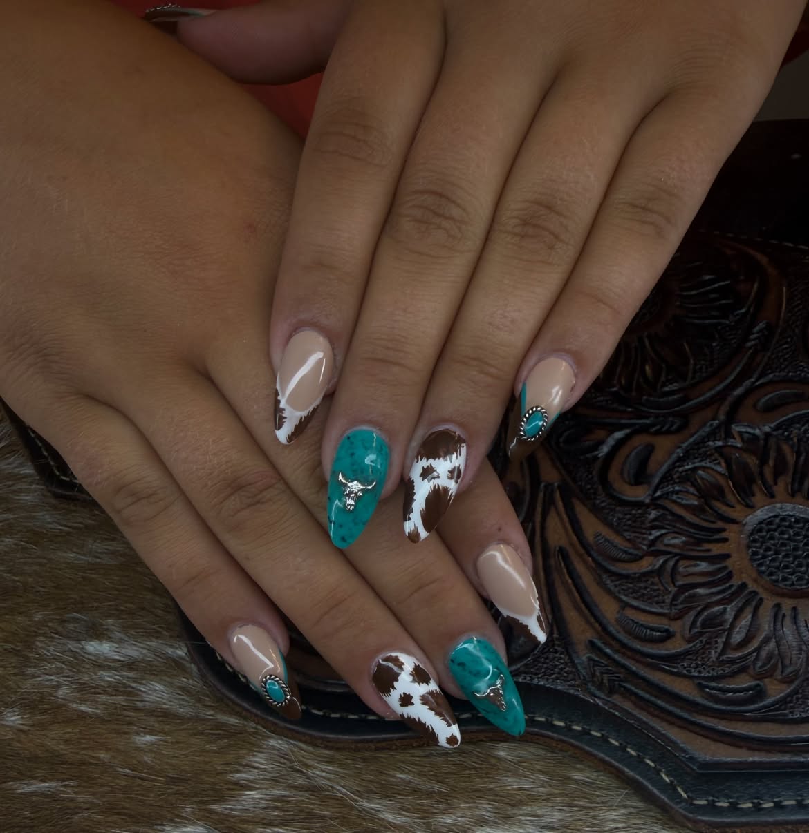 Turquoise Cow Print & Bull Skull Almond Nails