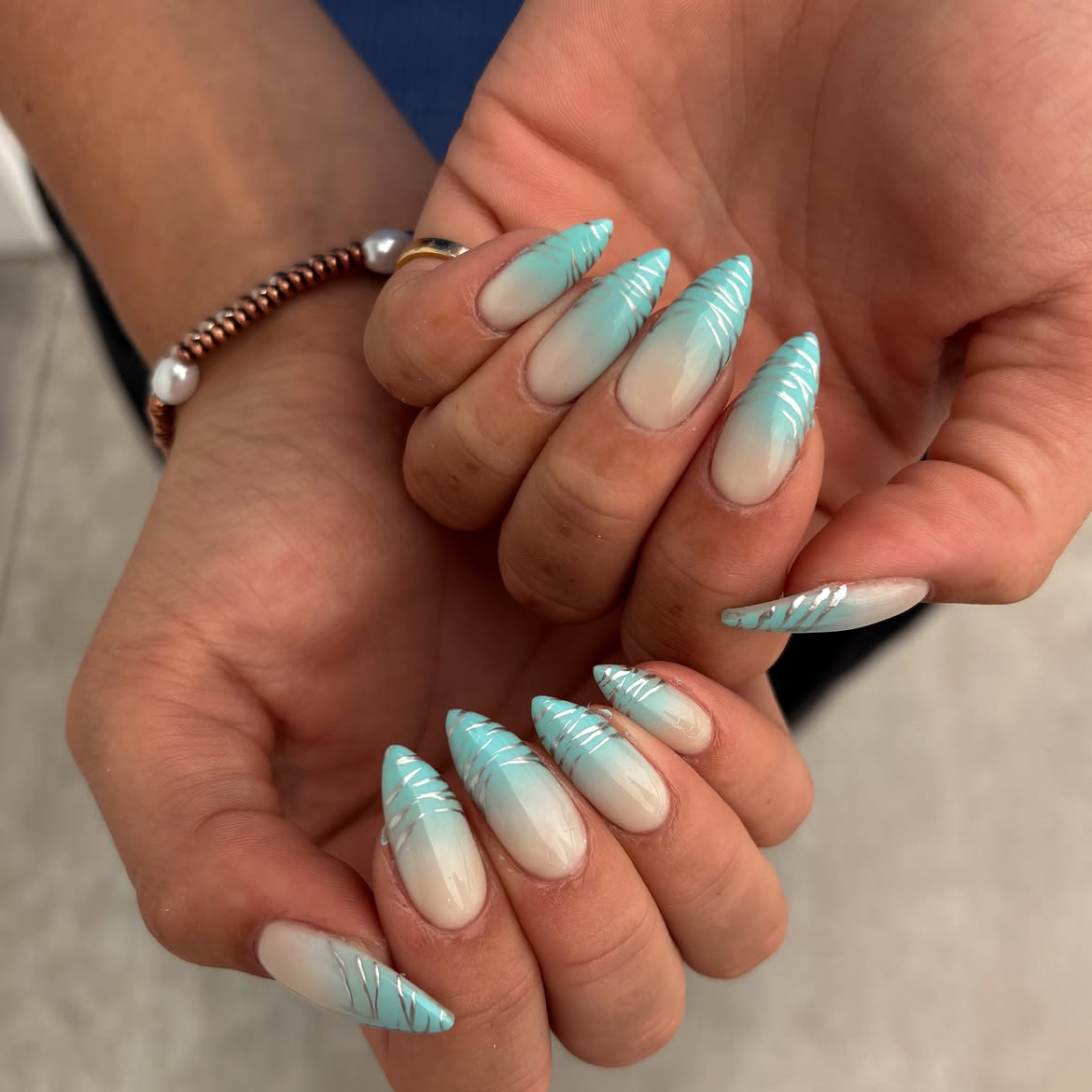 Turquoise Ombre Almond Nails With Silver Swirls