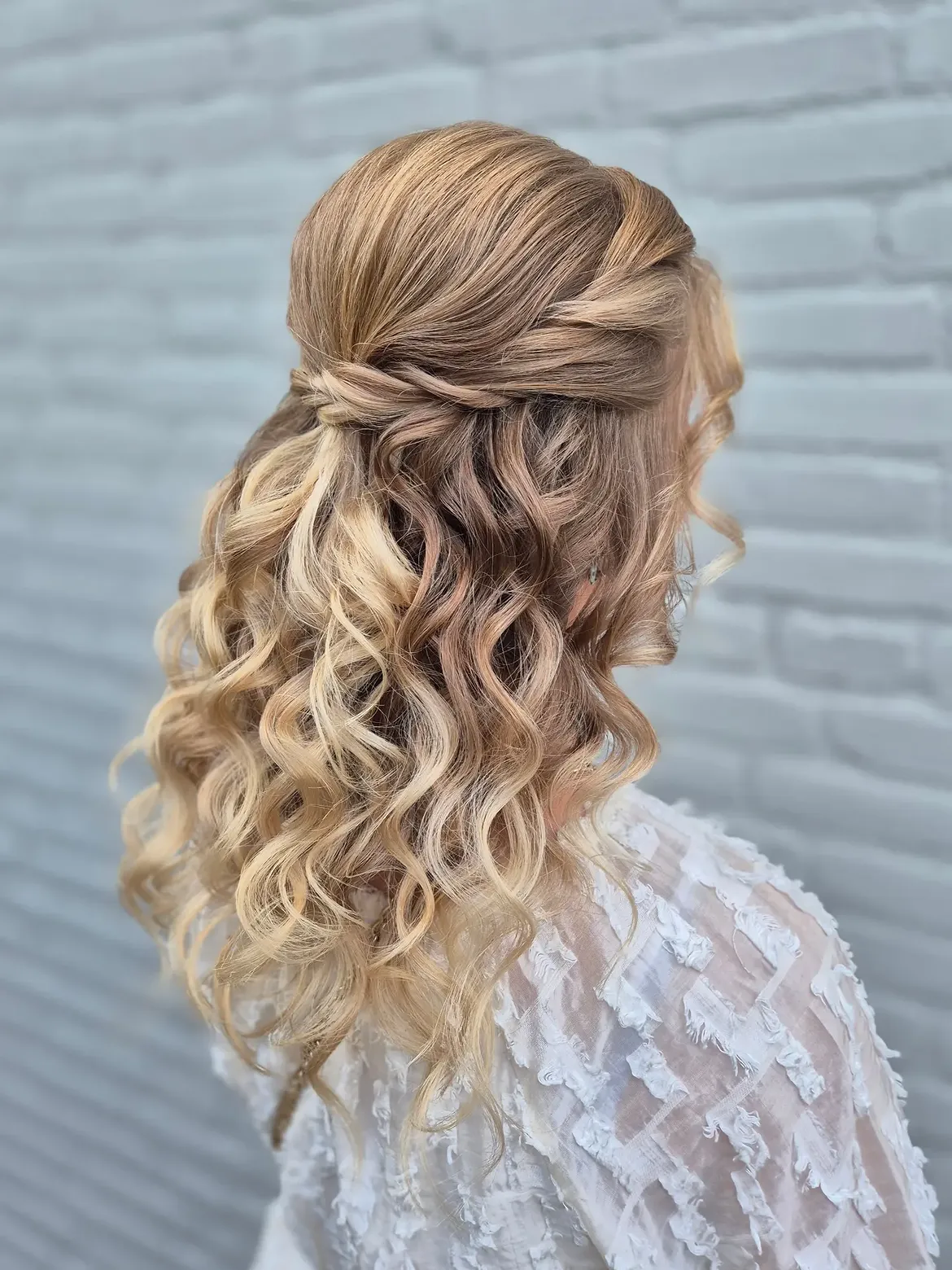 Twisted Half Updo With Cascading Beach Waves