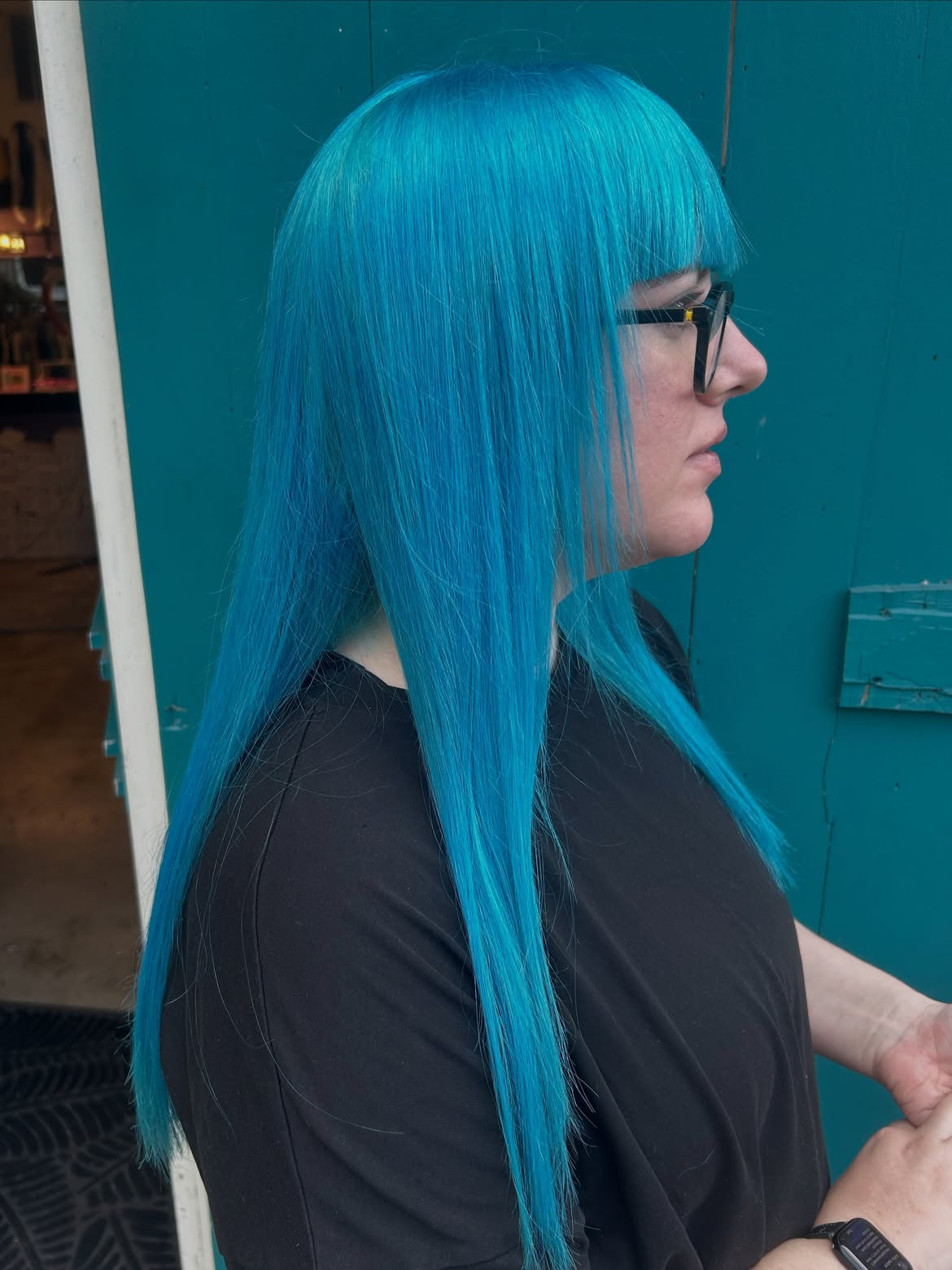Vibrant Blue Statement Cut With Wispy Bangs