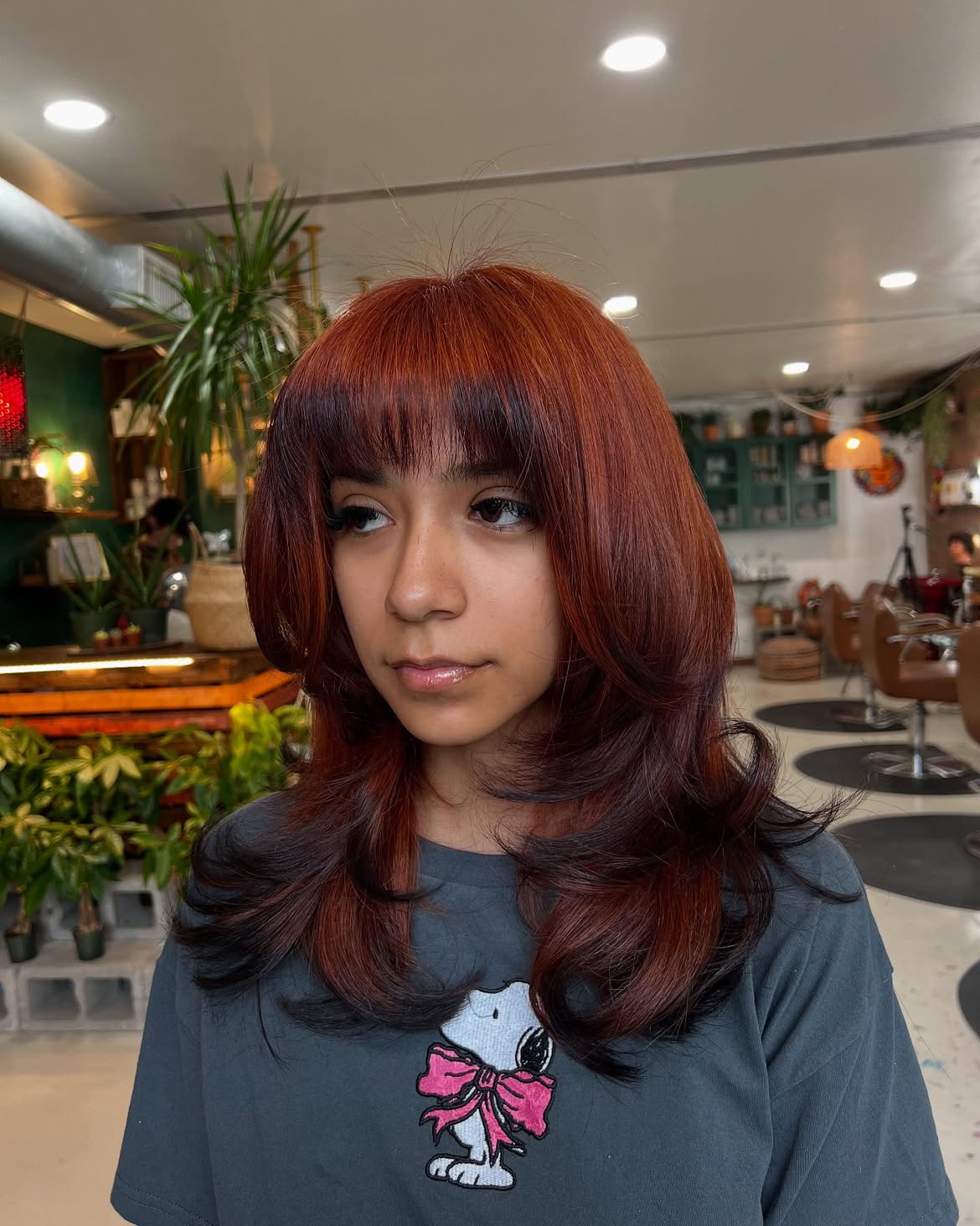 Vibrant Copper Butterfly Cut With Dark Roots