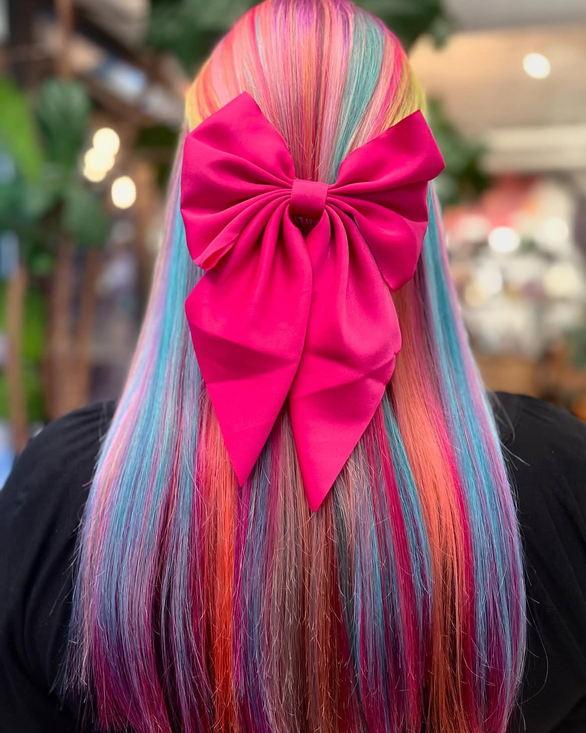 Vibrant Pastel Rainbow Hair With Oversized Bow